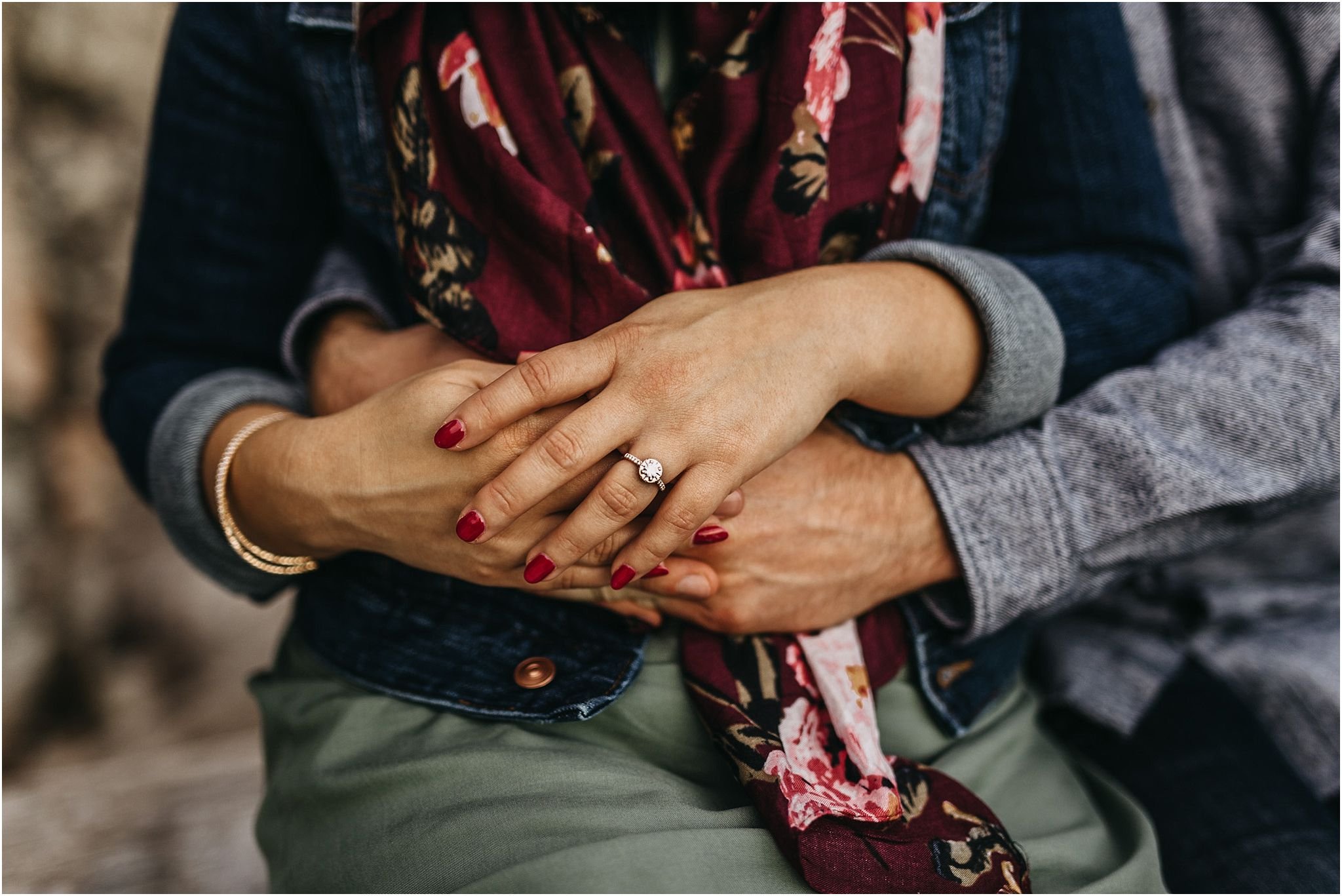 engagement ring holding hand close up 