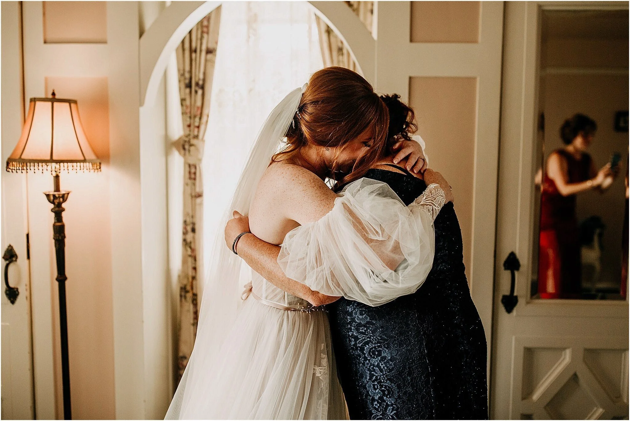 bride hugs mom Minnekhada Lodge Port Coquitlam BC