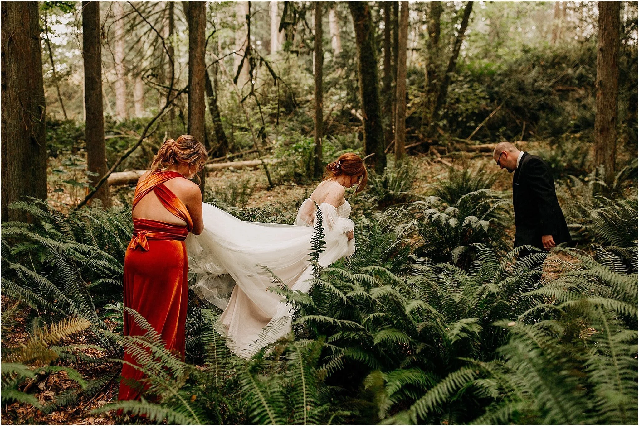 bride walking through forest Minnekhada regional park Port Coquitlam BC
