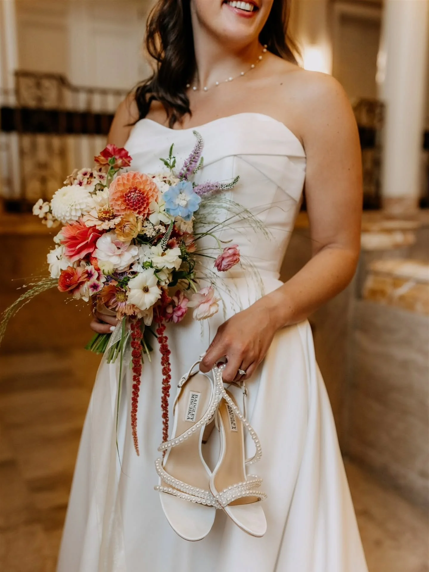 Would you believe that it was absolutely pouring rain on their wedding day just by looking at these photos? Caroline + Andrew were the epitome of not letting anything rain on their parade (har har) 🌧️. They soaked up every moment with their intimate