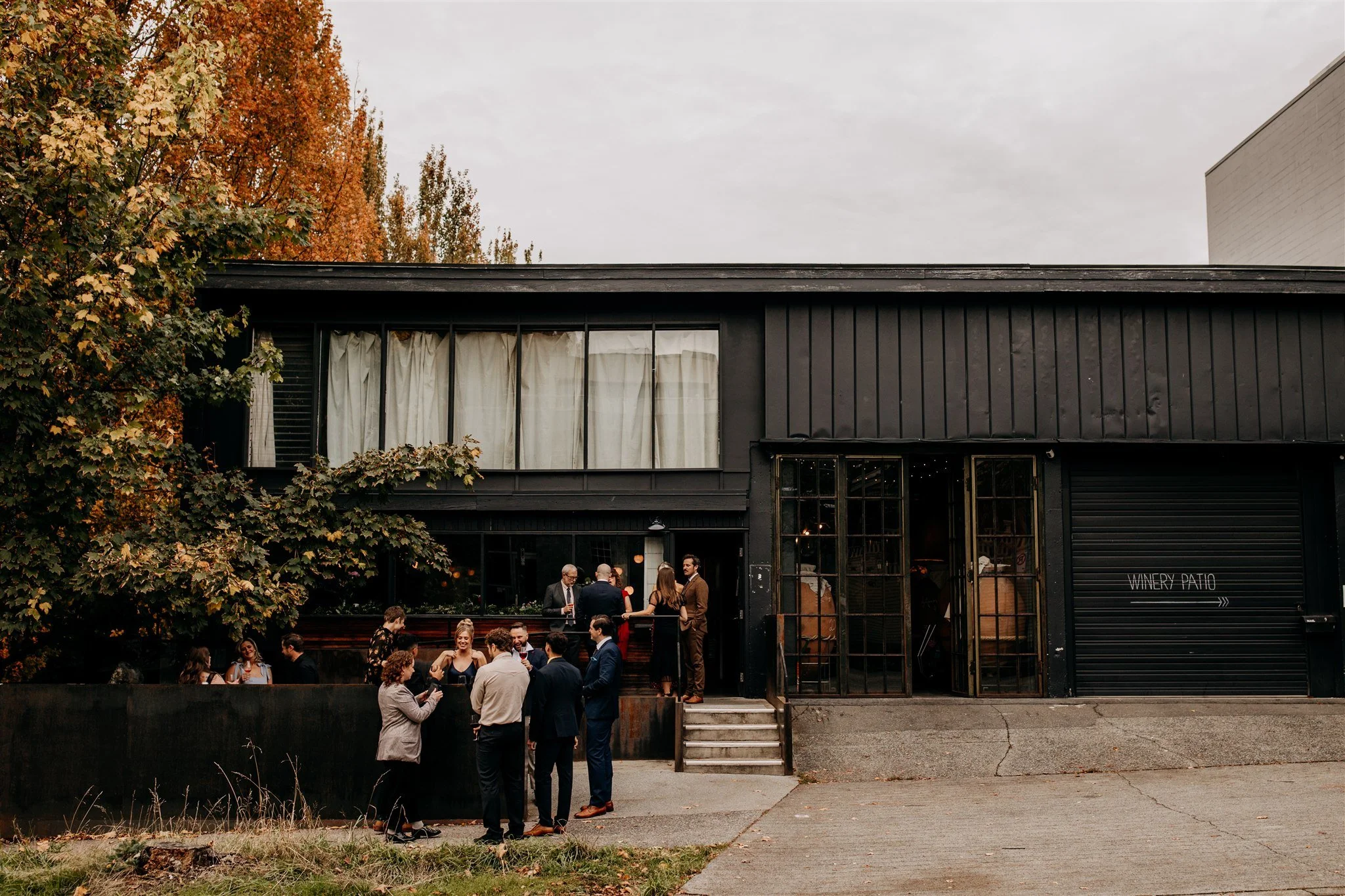 wedding guests mingling outside La Fabrique St George 