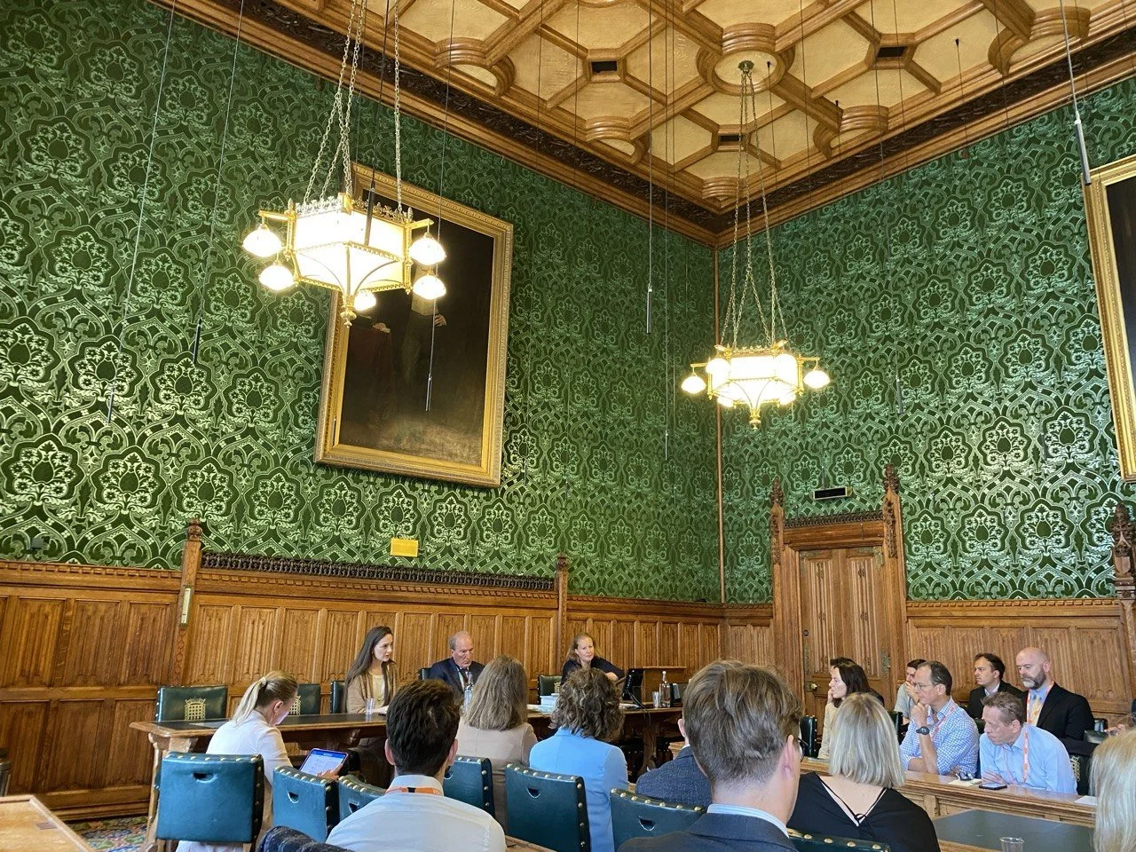 Audience and speakers gathered for a discussion at the House of Lords