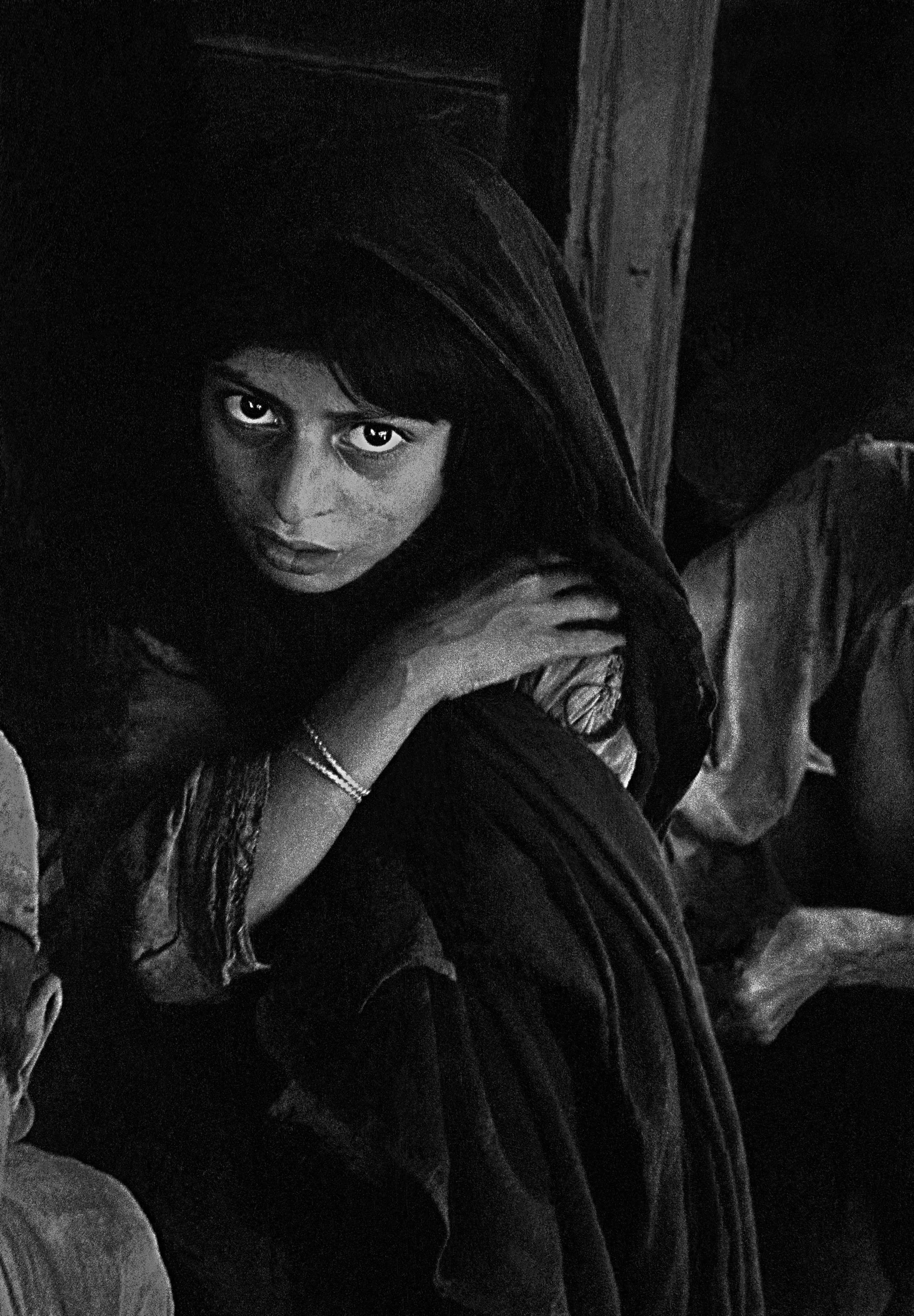 1952, Lahore, Pakistan, girl in the street, at night