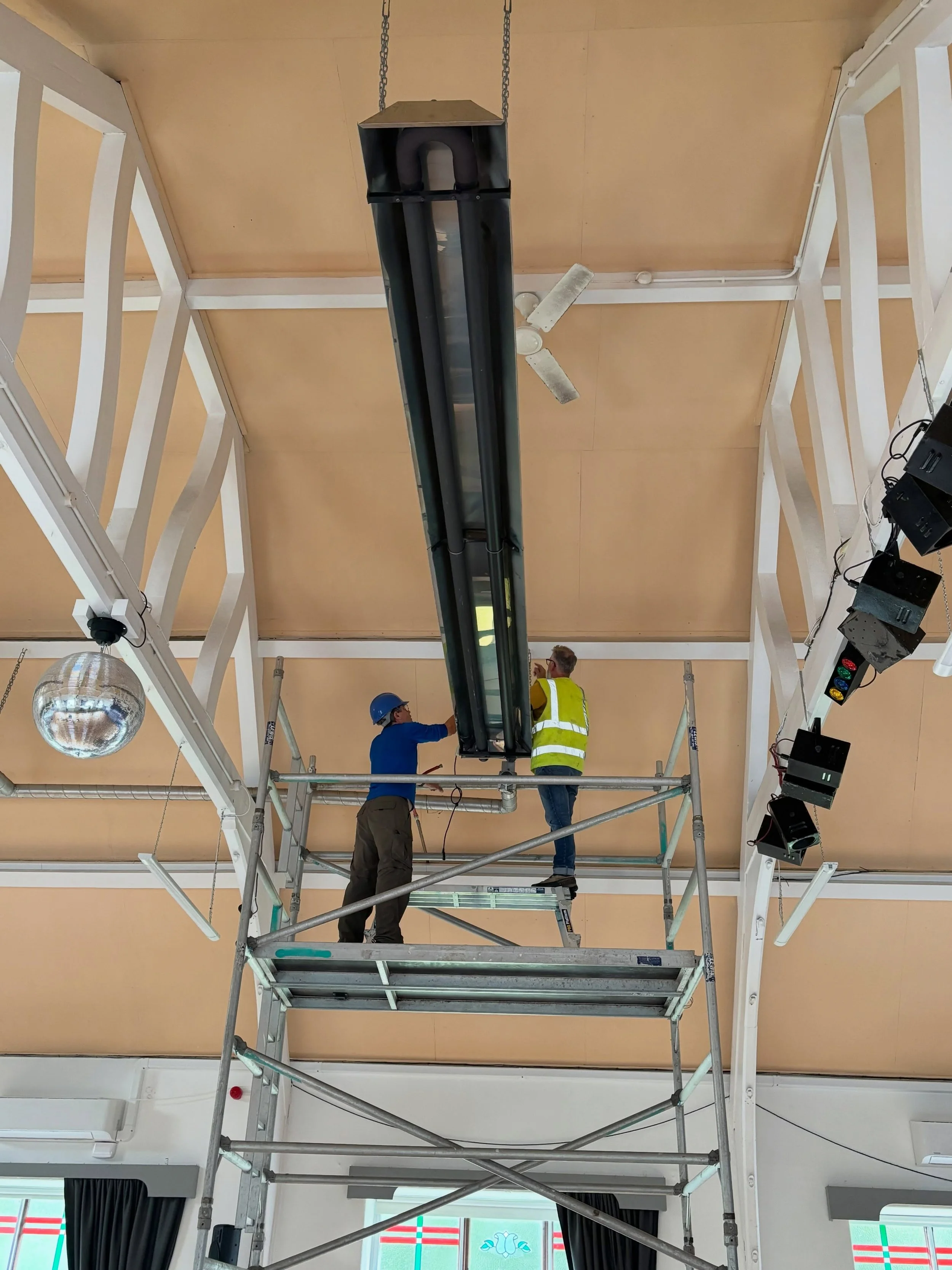Our old gas heaters have finally come down! 🙌
Huge thanks to John, Jonathan, Hannah, John and Nick for the high-flying removal job &mdash; quite a feat involving scaffolding, climbing gear to get the four enormous heaters down from the ceiling!

Loo
