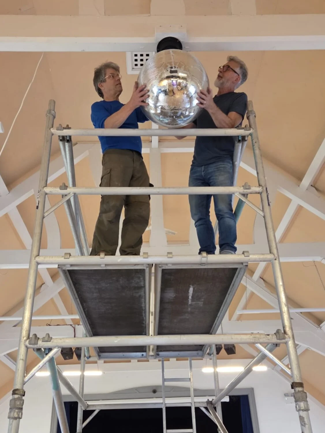 Three men and a glitter ball! 🪩 John, Nick and Jonathan were up in the rafters today, replacing the disco ball at Llangoed Village Hall.

A big thank you to all three for keeping the Hall ready for its next dance floor moment!

. . .

Tri dyn a ph&e
