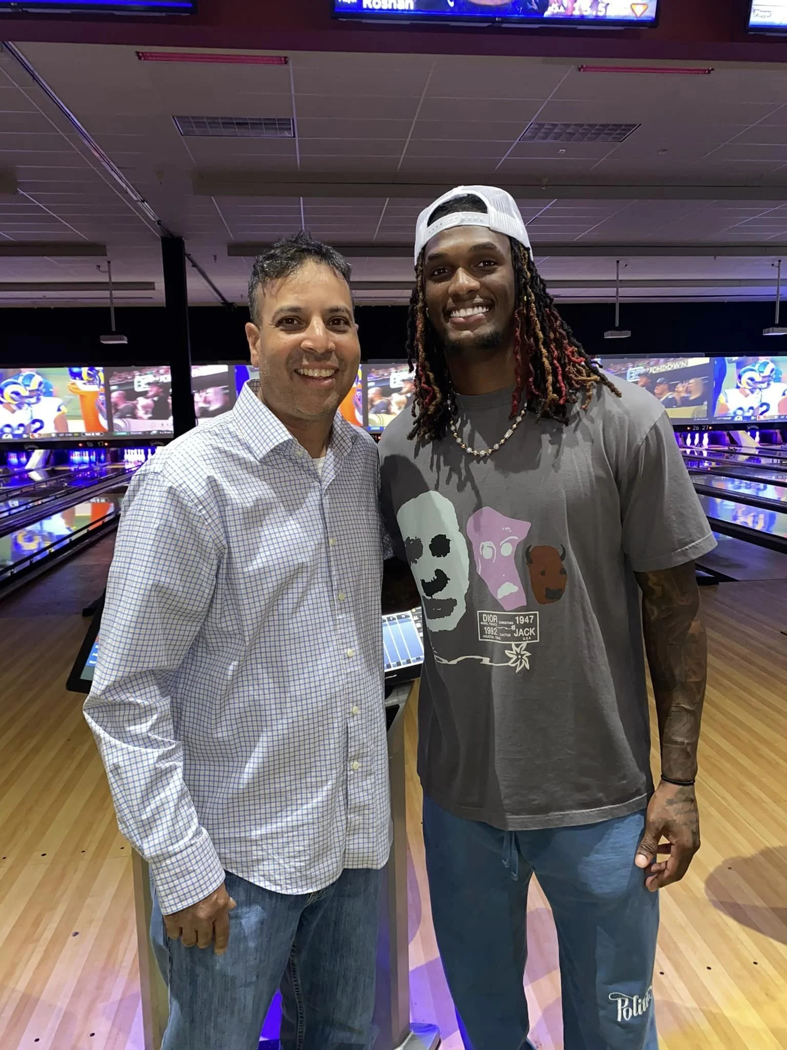 CeeDee Lamb w_Omar Selod.jpg