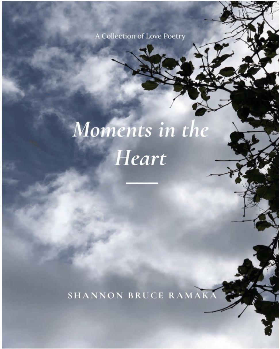 Book cover titled 'Moments in the Heart' by Shannon Bruce Ramaka with a background of cloudy sky and tree branches.