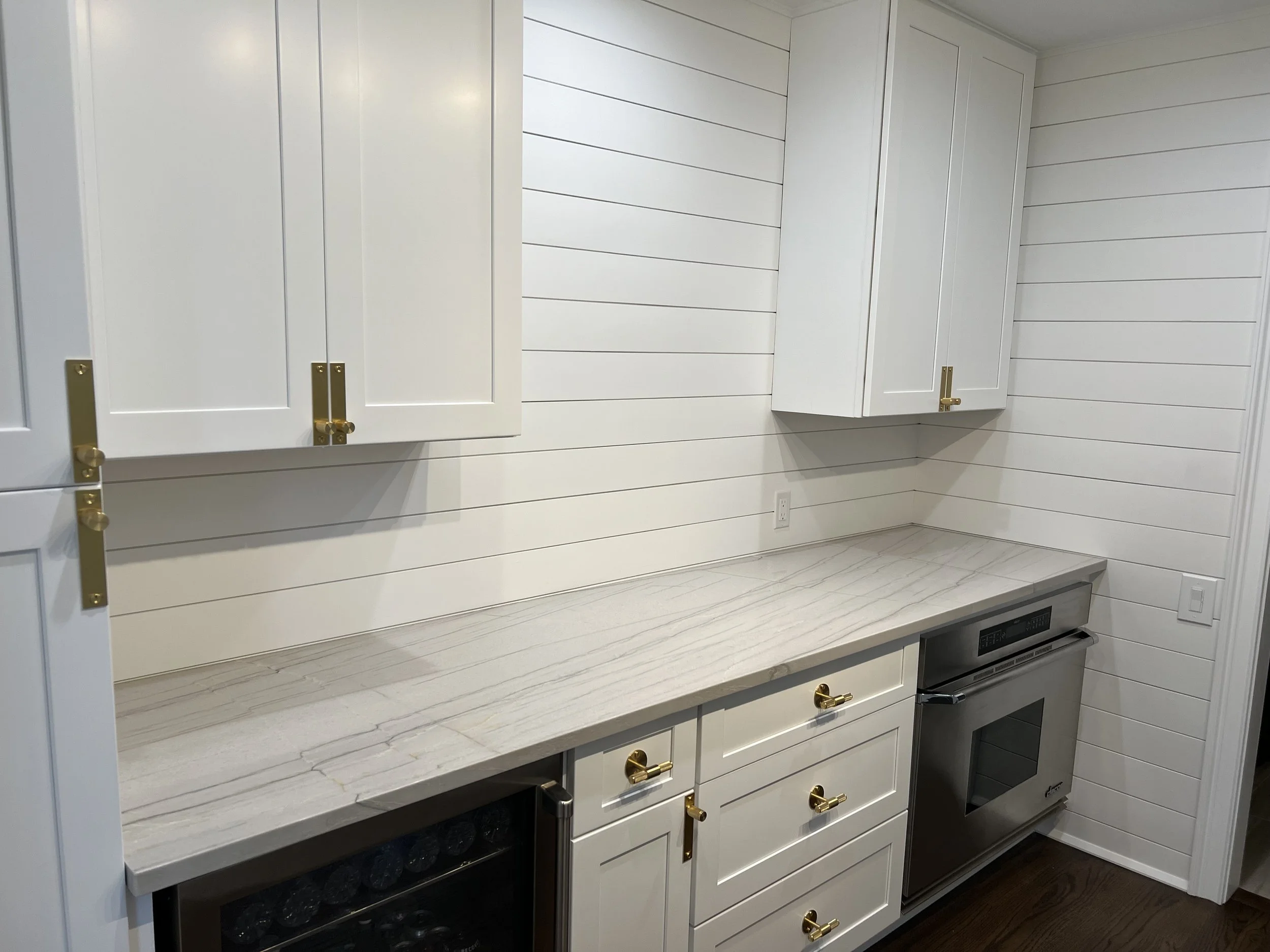 Bright Traditional Cottage Style Kitchen With White Cabinetry, Shiplap Walls, Brass Hardware, And Dark Wood Flooring Kitchen Remodel by Azimuth Home Improvements LLC project photo 5