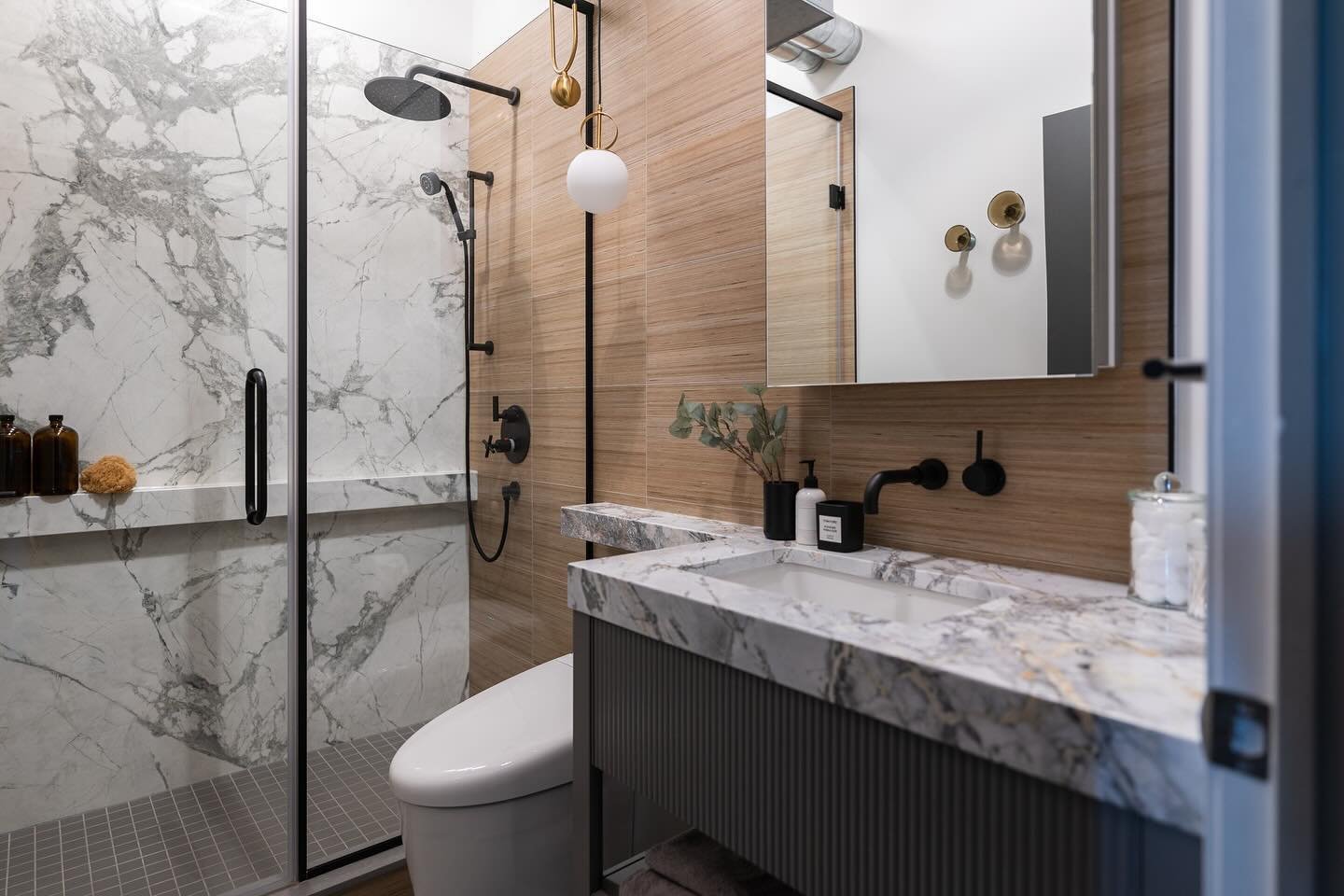 Edgy AF. 
For those who dare to stand out.

Swipe for the before &amp; after. 

Designed by: @debra_salmoni 
.
.
.
#InteriorDesign #DesignInspiration #bathroomdesign #bathroomremodel #homerenovation #luxuryinteriors #beforeandafter #moderndesign