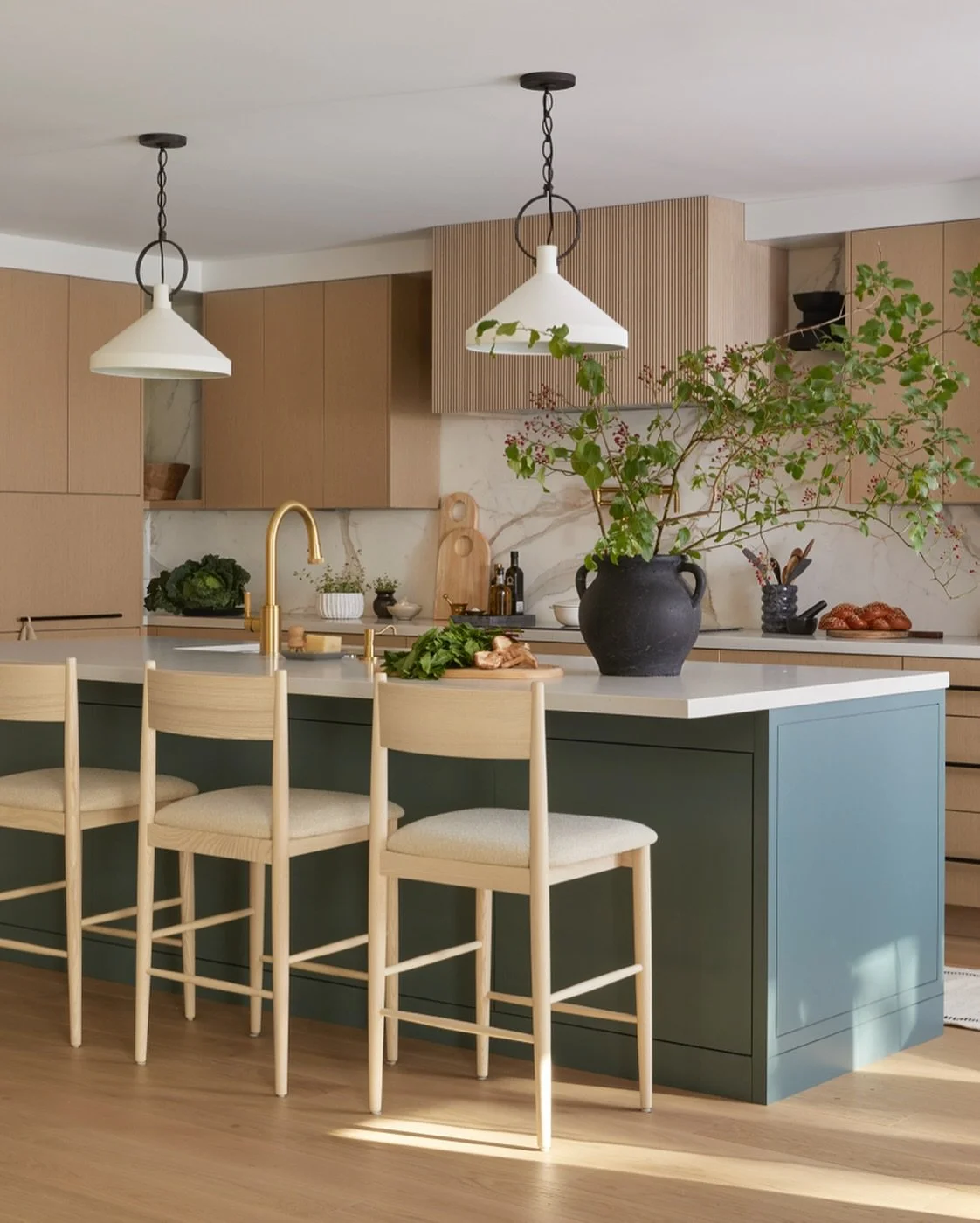 A bold pop of colour in this stunning white oak kitchen 

Designed by me @debra_salmoni