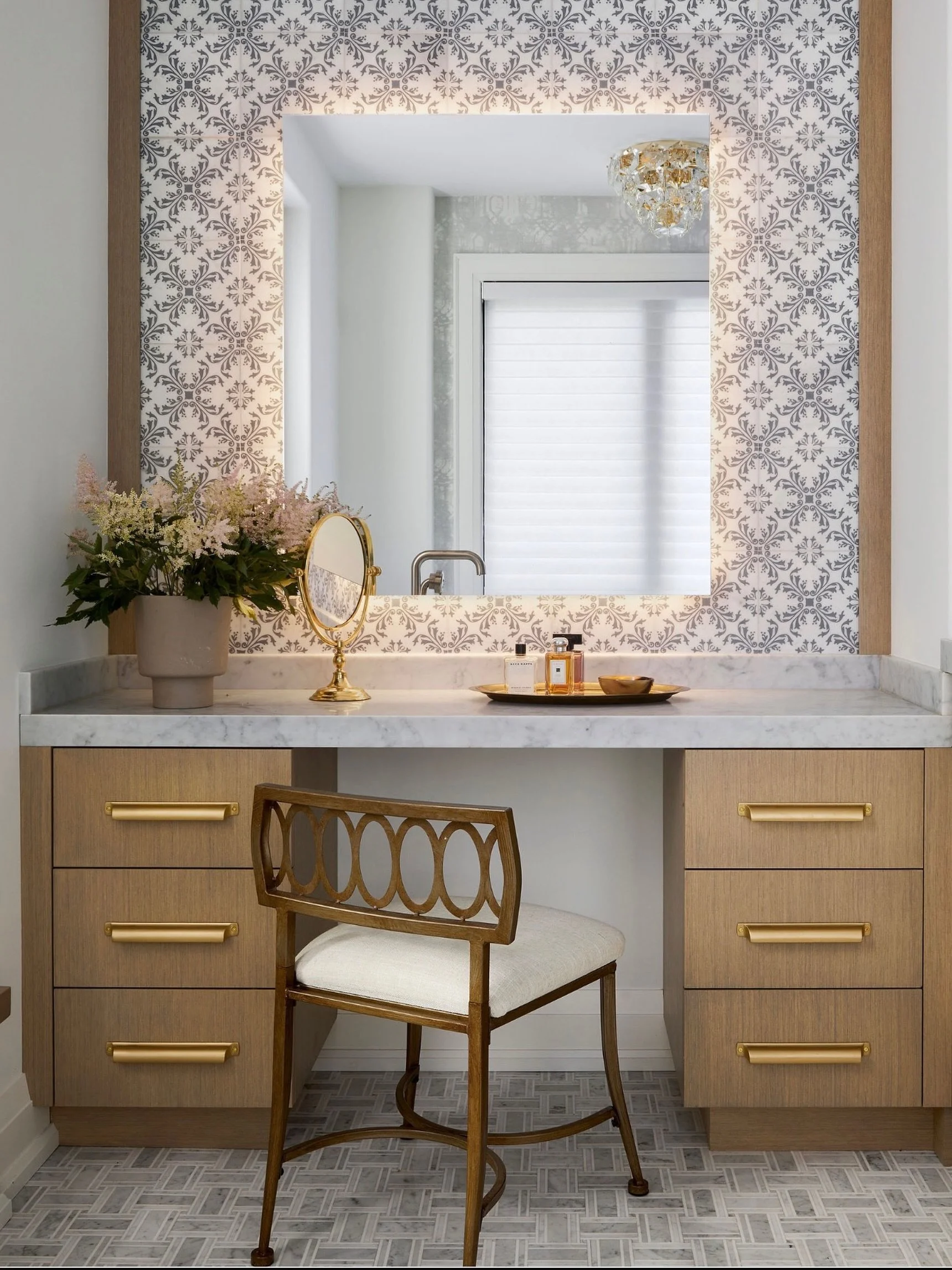 Hand painted tile, a vintage chair, and soft backlit lighting for that extra glow.

A little moment for the ladies. 💄

Designed by DebraLillianDesign @debra_salmoni 
Styled by @_meandmo_ 
📸 @lomillerphoto