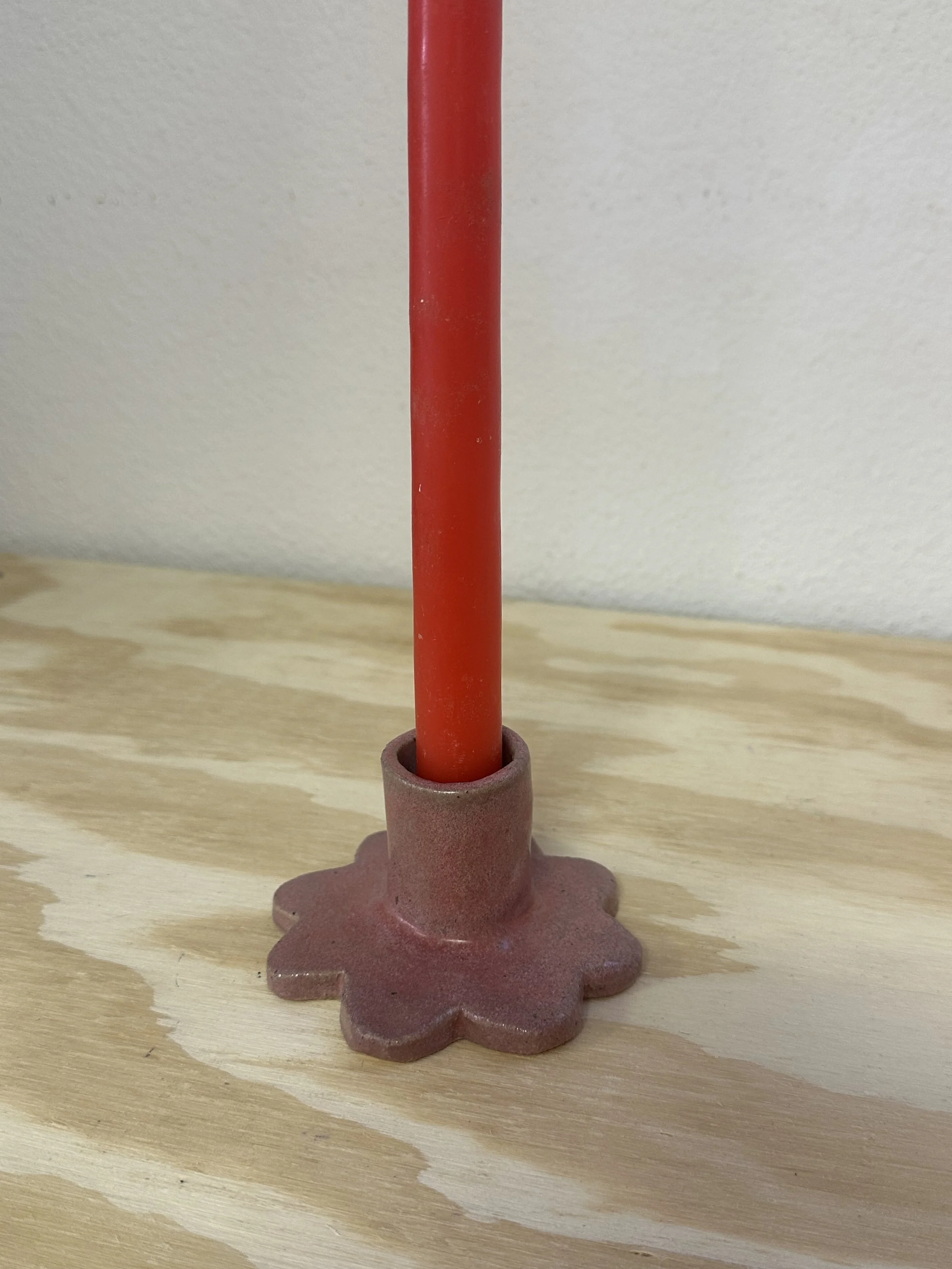 pink candlestick holder