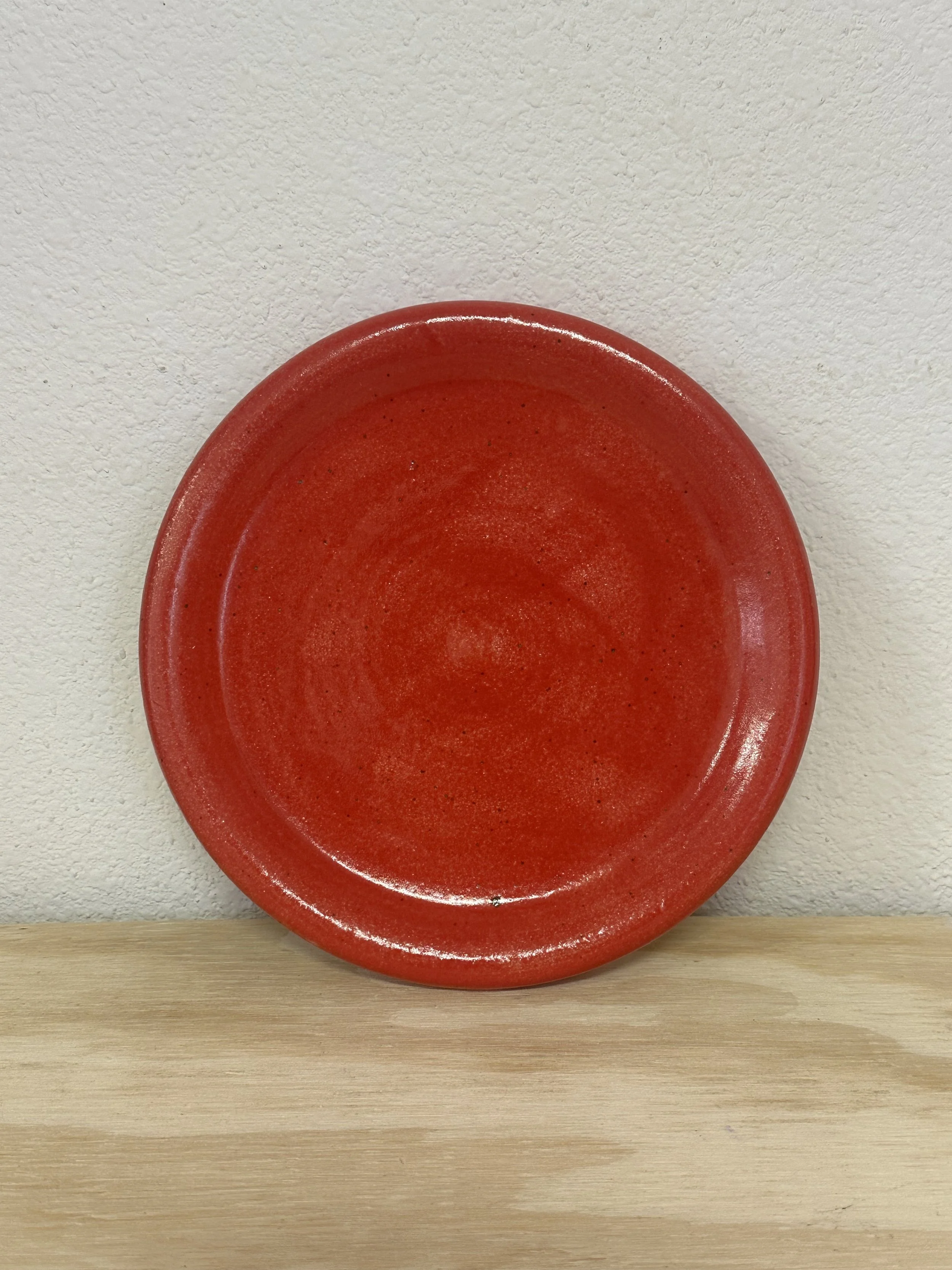 shiny red bubble plate