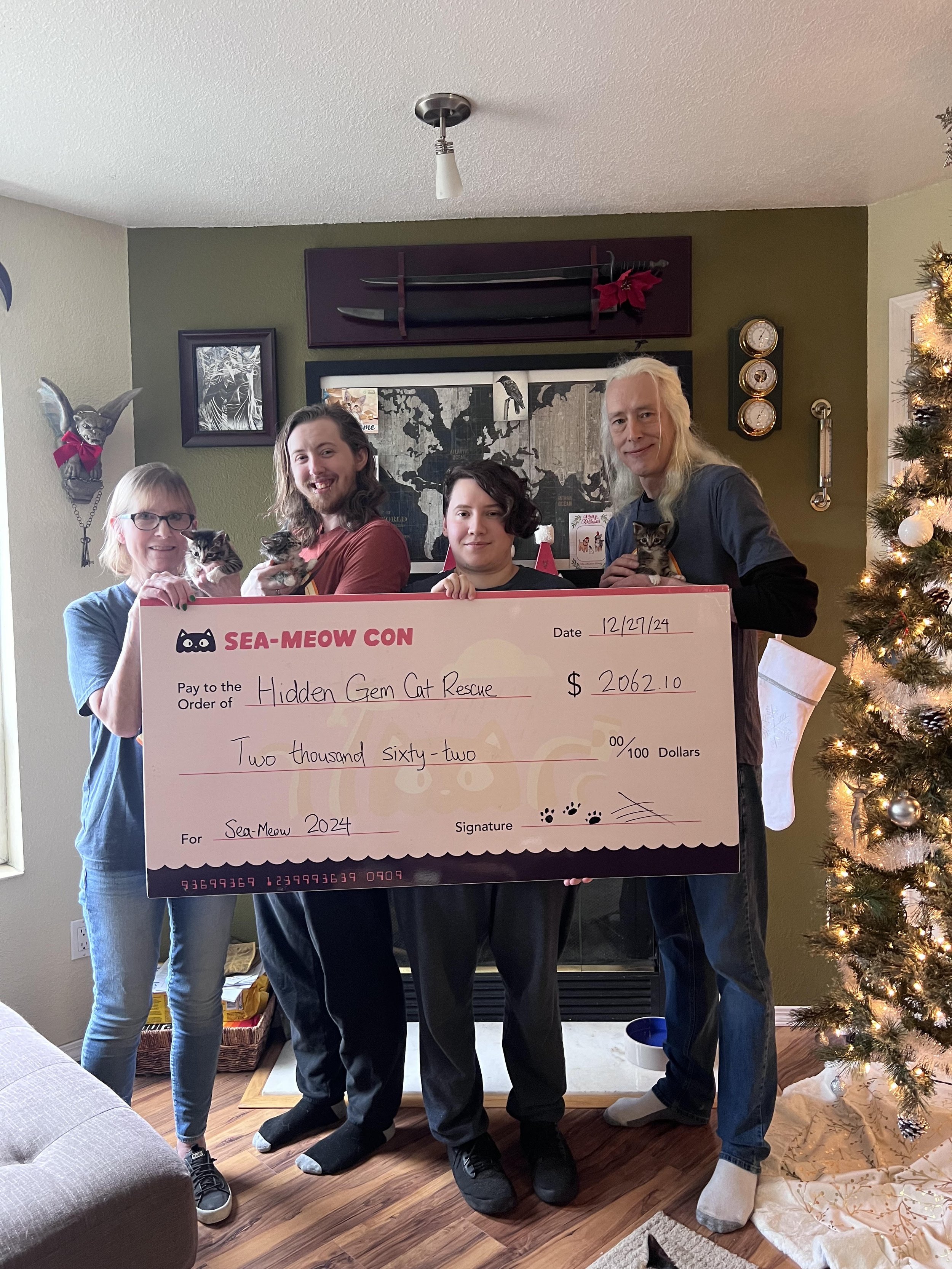 Hidden Gem Cat Rescue big check.jpg