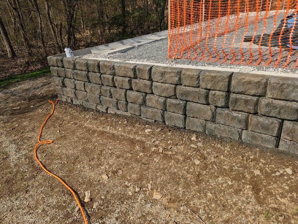 Today we colored these Redi-rock retaining blocks on this pool project in Pepperell MA.
call today to get your retaining wall blocks custom colored!