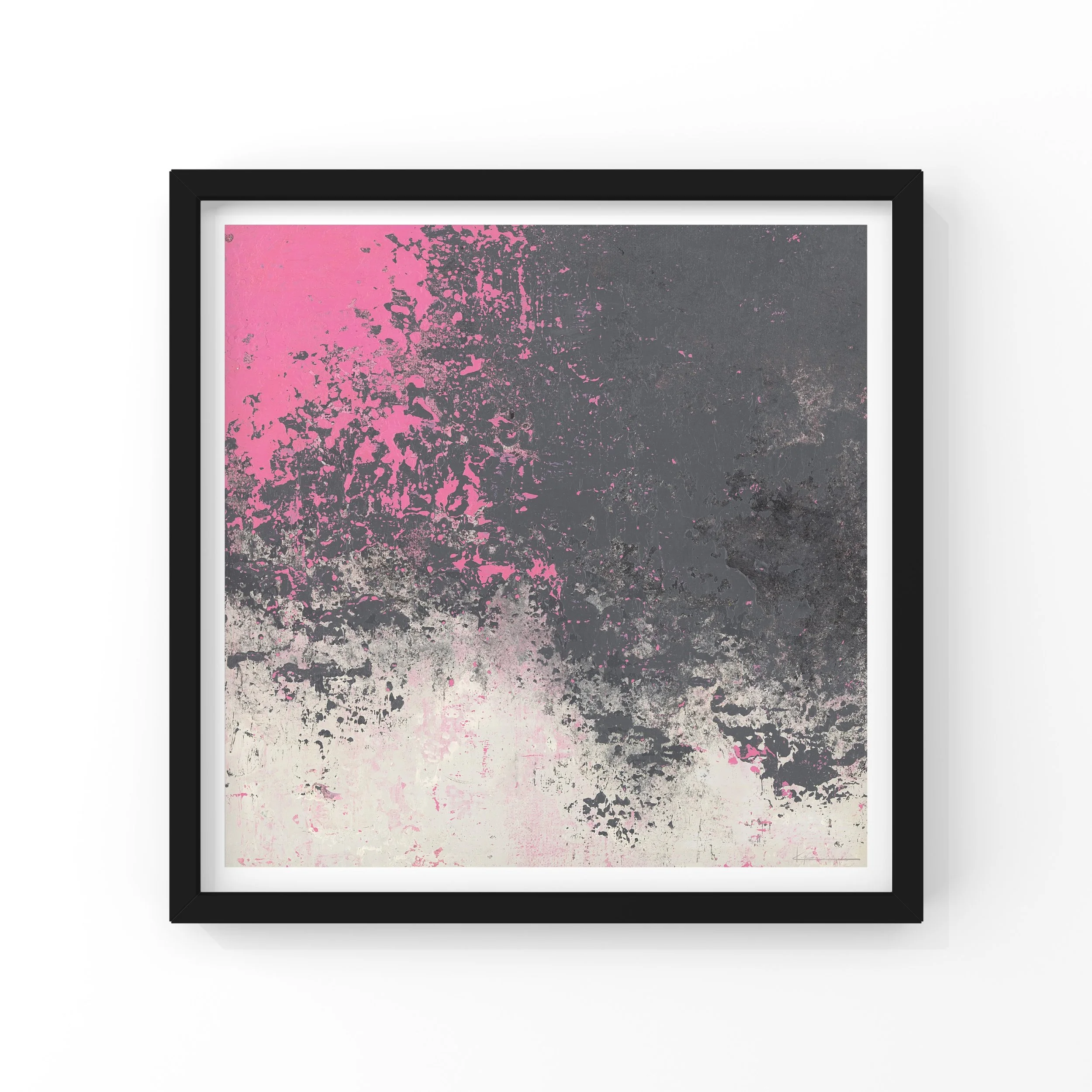 Abstract artwork with pink, gray, and white splatters framed in black on a white wall.