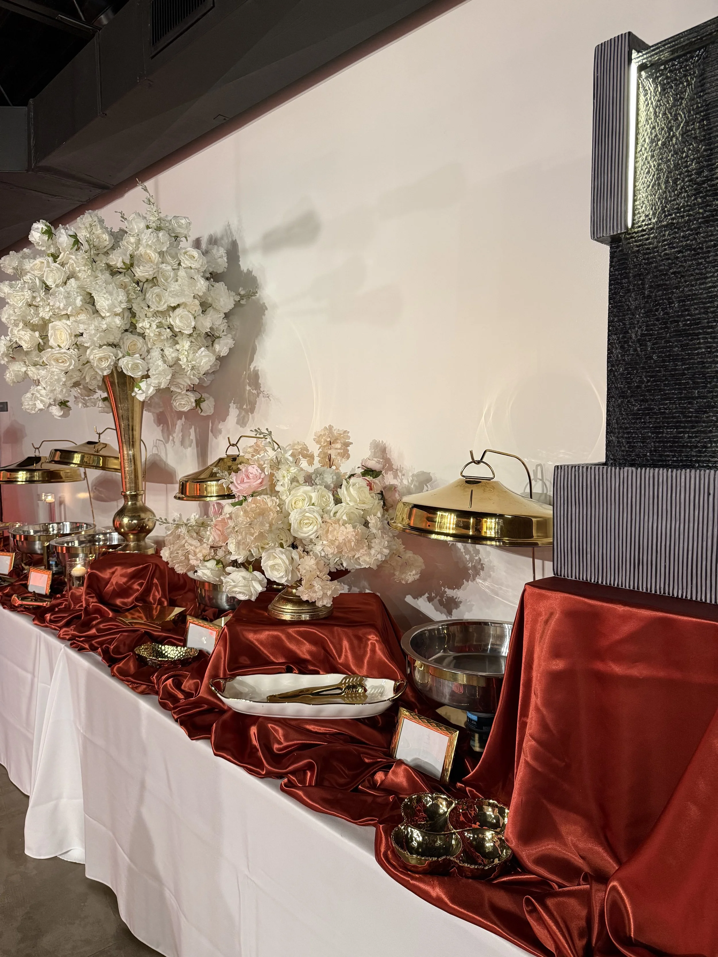 Gorgeous catering decor for 50th birthday setup at Bee Real Event Space located in Portsmouth, VA. Fits up to 65 guest with custom decor options. 