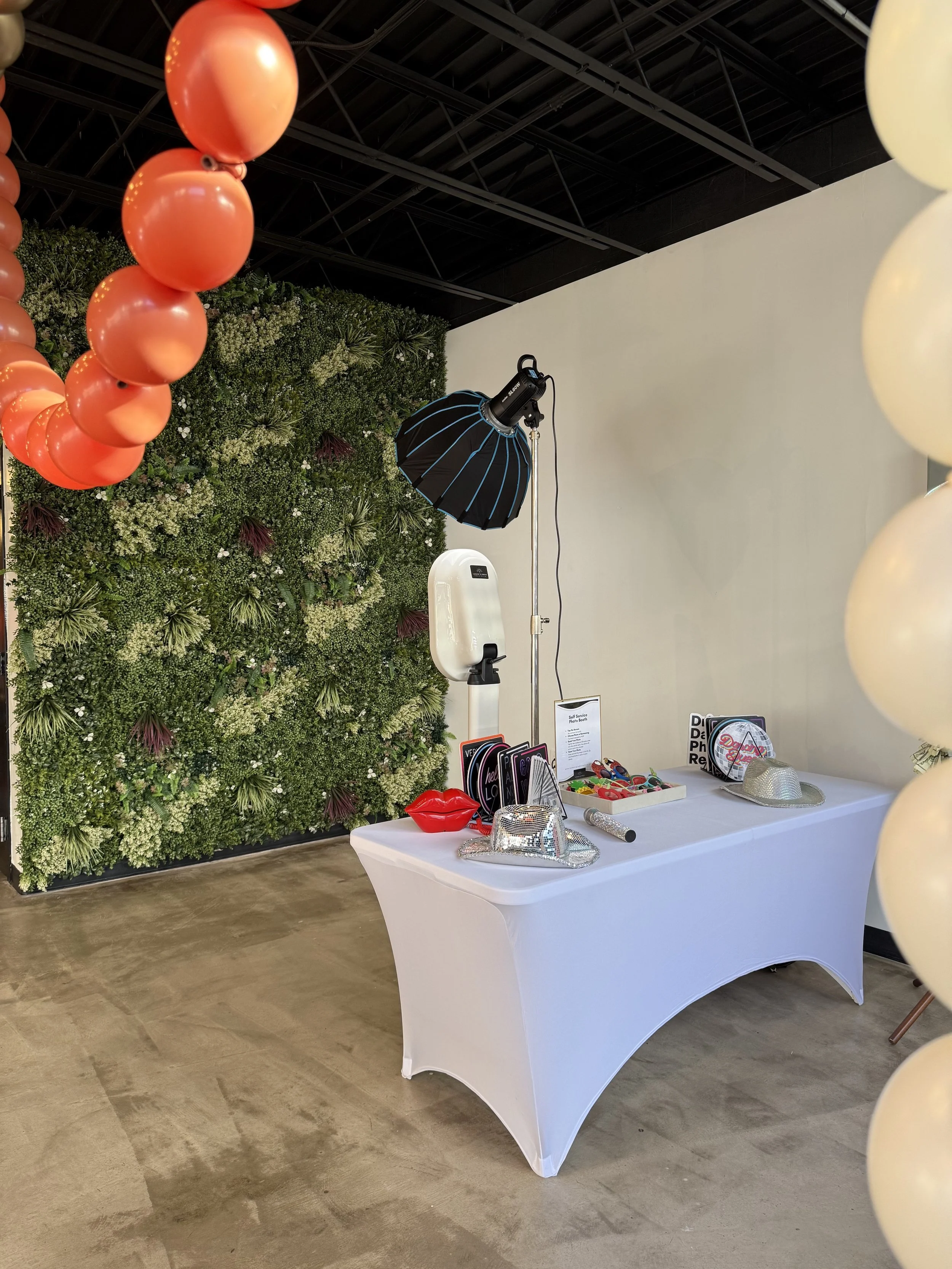 Full photo booth setup at Bee Real Event Space in Portsmouth, VA. Fits up to 65 guest with custom decor options. 