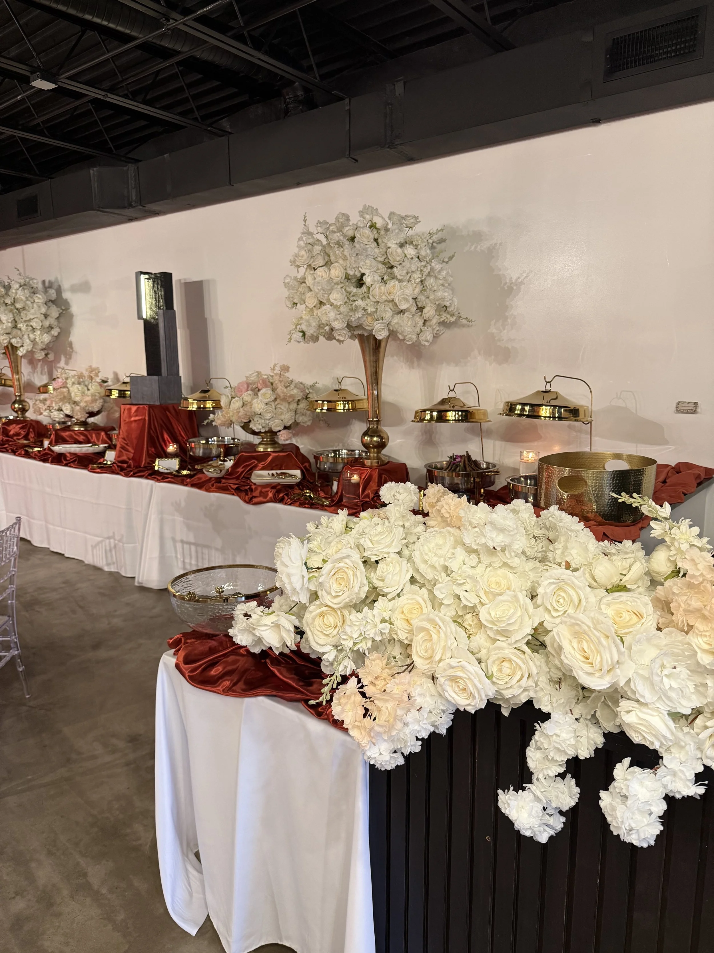 Gorgeous catering decor for 50th birthday setup at Bee Real Event Space located in Portsmouth, VA. Fits up to 65 guest with custom decor options. 