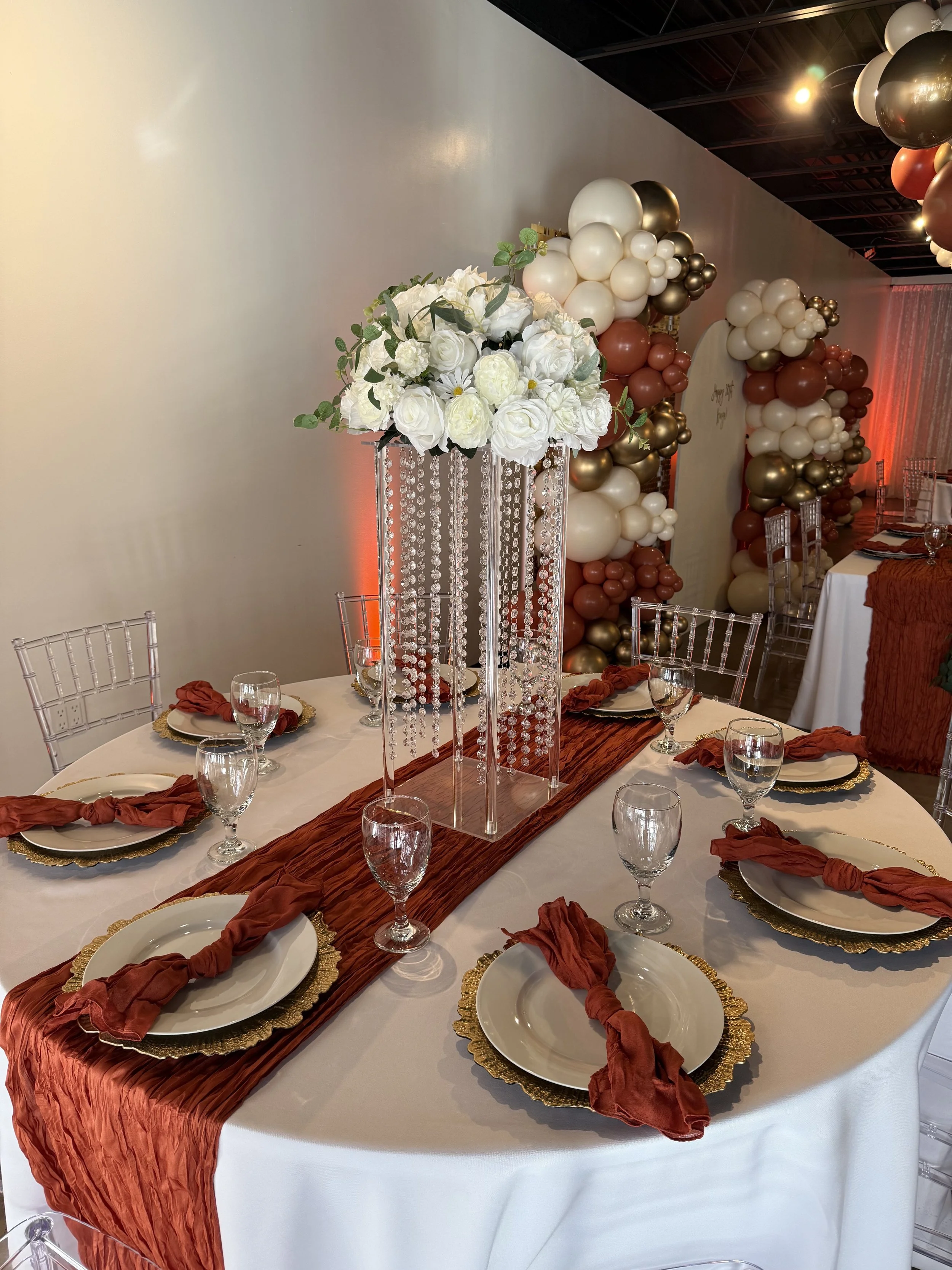 Elegant birthday table setup at Bee Real Event Space in Portsmouth, VA. Fits up to 65 guest with custom decor options. 