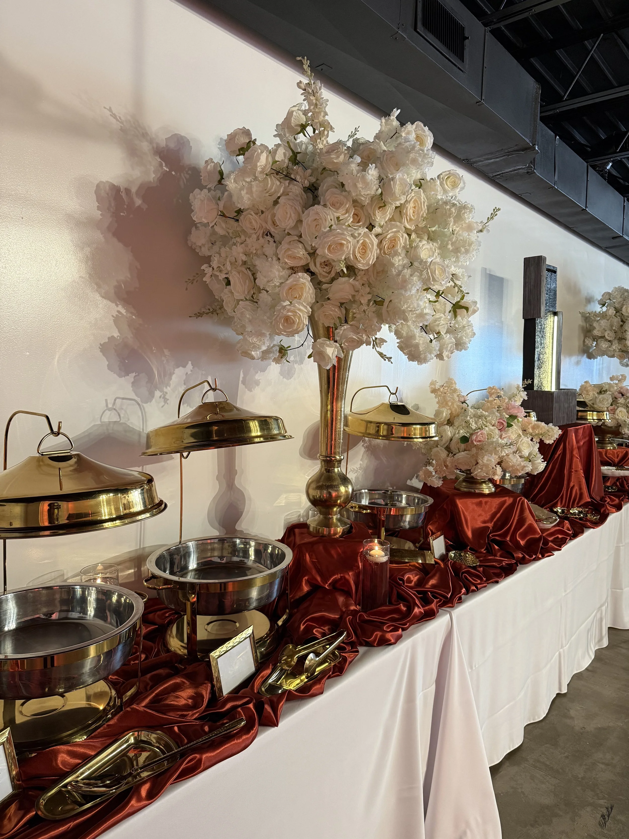 Gorgeous catering decor for 50th birthday setup at Bee Real Event Space located in Portsmouth, VA. Fits up to 65 guest with custom decor options. 
