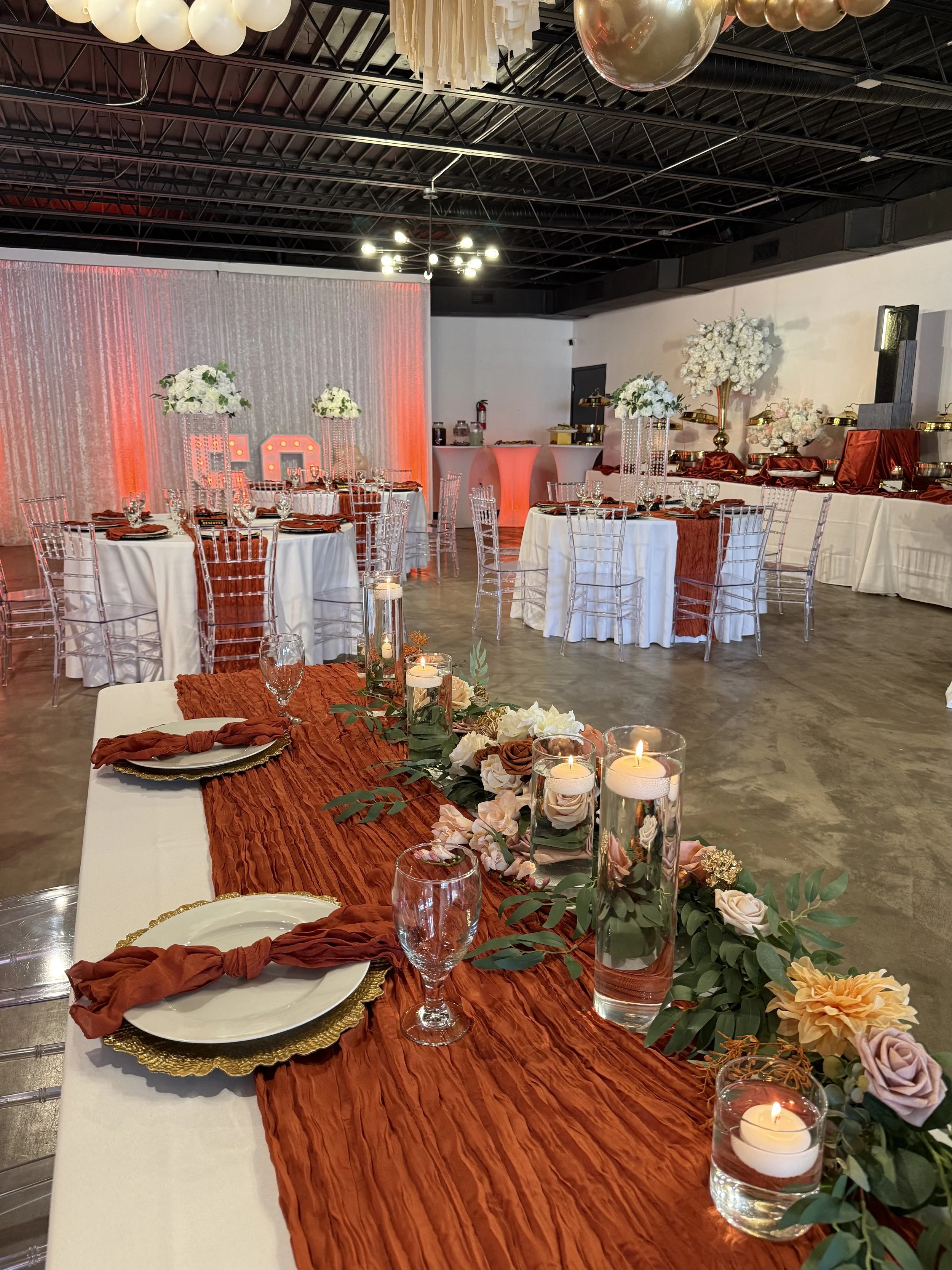 Elegant birthday setup with sweetheart table at Bee Real Event Space in Portsmouth, VA. Fits up to 65 guest with custom decor options. 