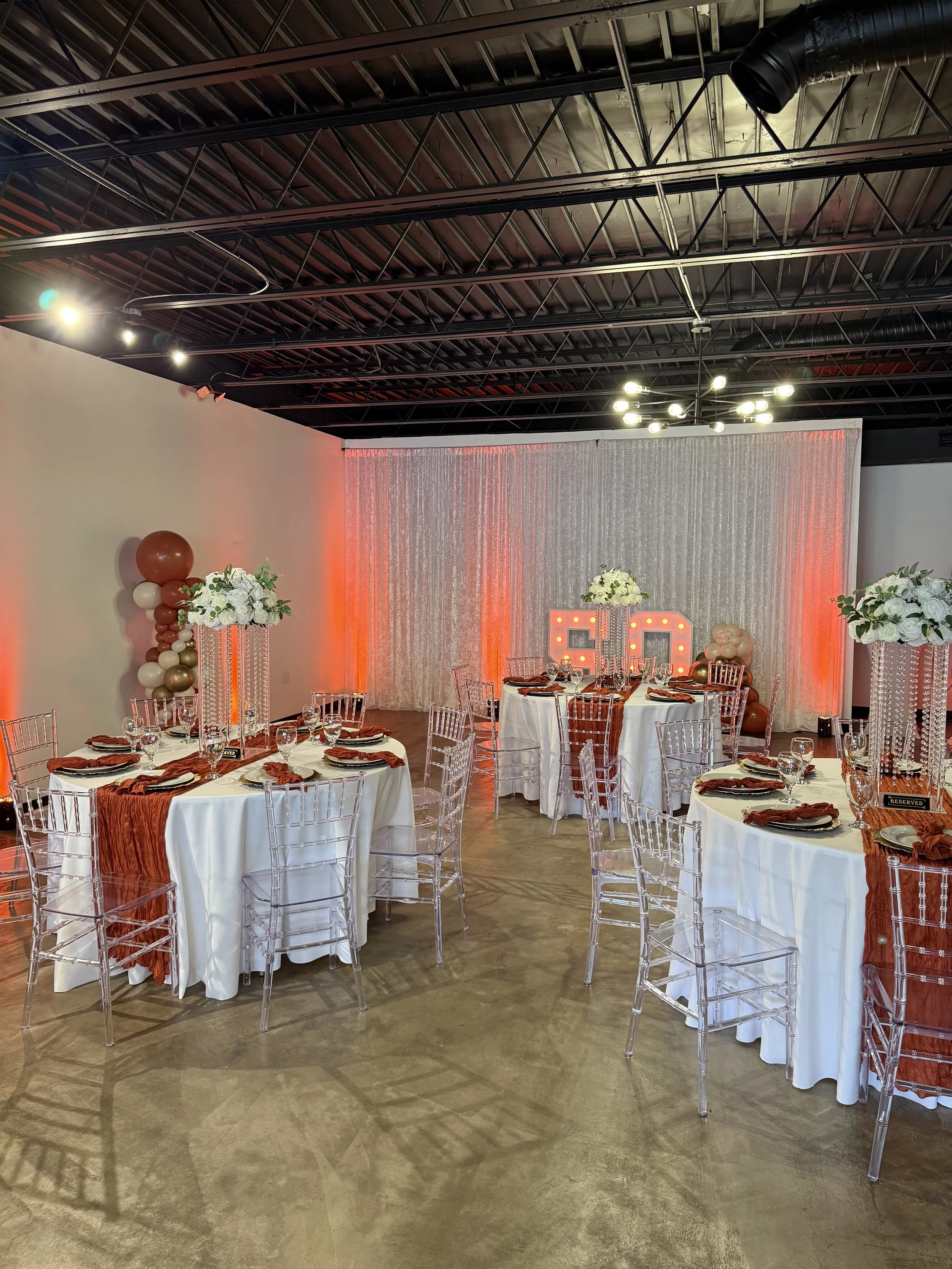 Elegant birthday seating layout at Bee Real Event Space in Portsmouth, VA. Fits up to 65 guest with custom decor options. 