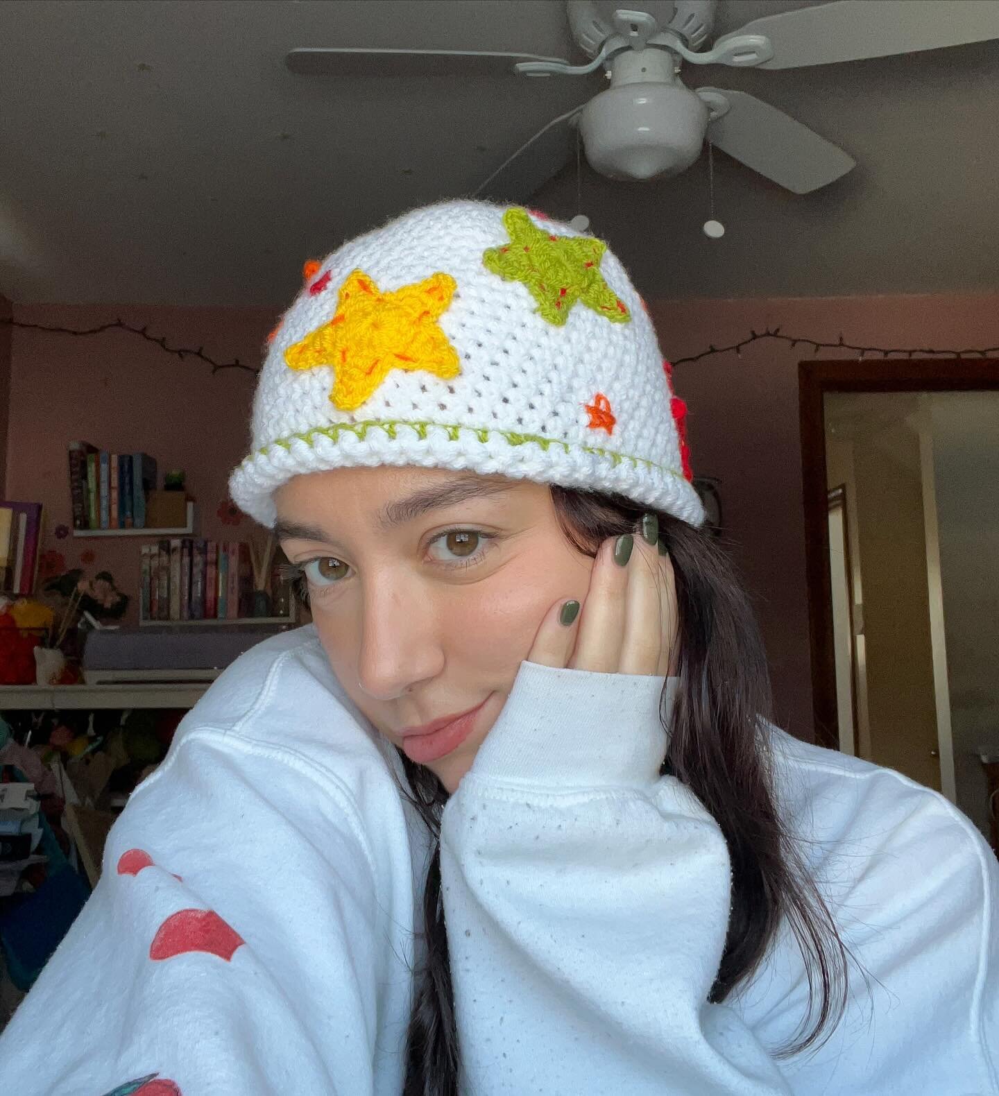 first FO of 2024! a little hat for my partner&rsquo;s birthday :) i had the idea for a mismatched, patchwork hat, and i thought stars would be an added level of coolness (and not to toot my own horn but i think i was right!)

anyways i just freehande