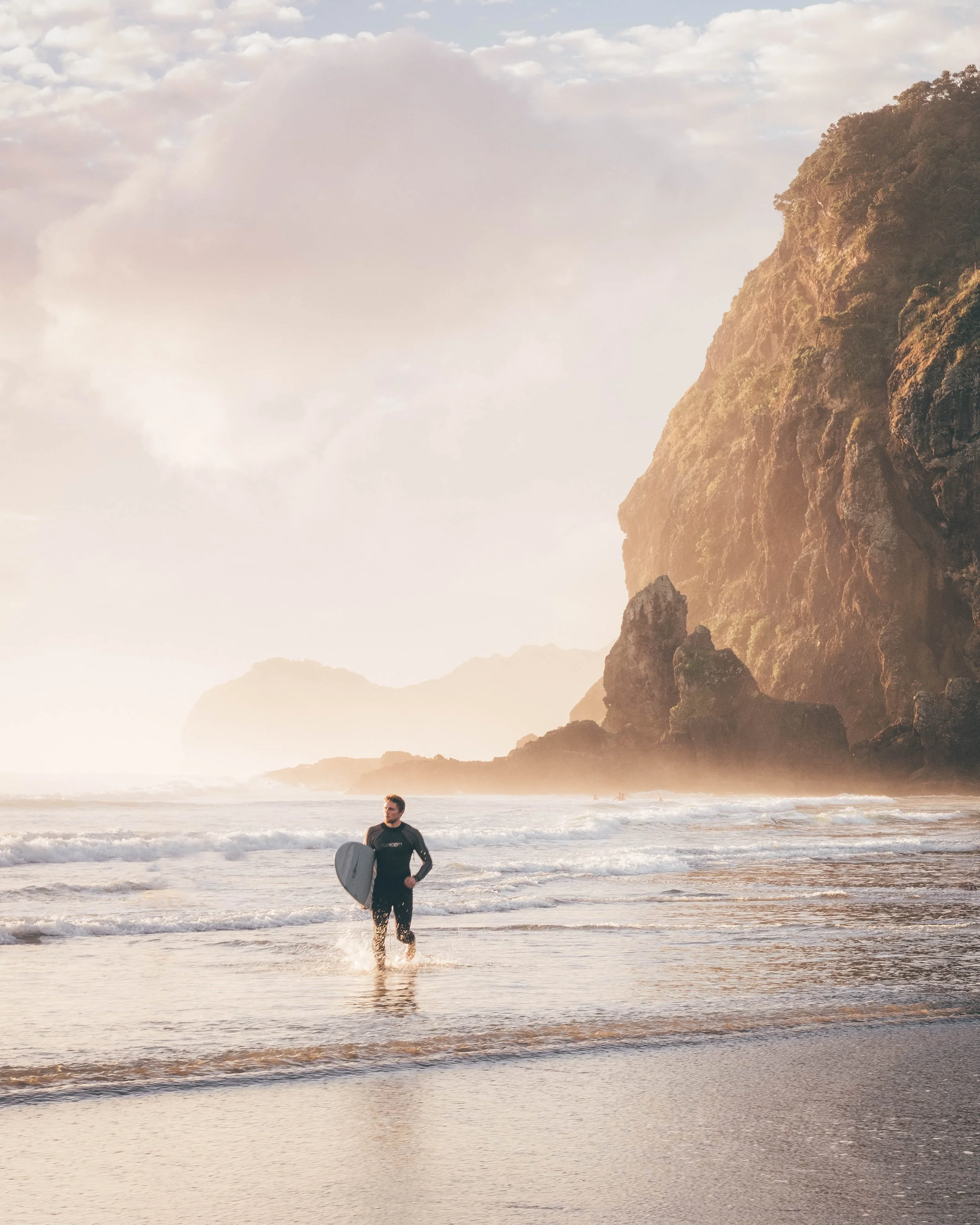 Aleks Running at Piha.JPG