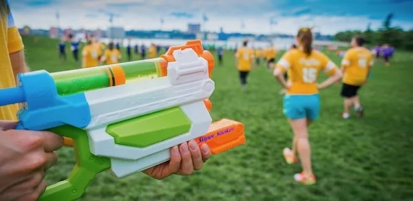 Water blaster games bring splash-filled excitement and friendly competition to any adult birthday party