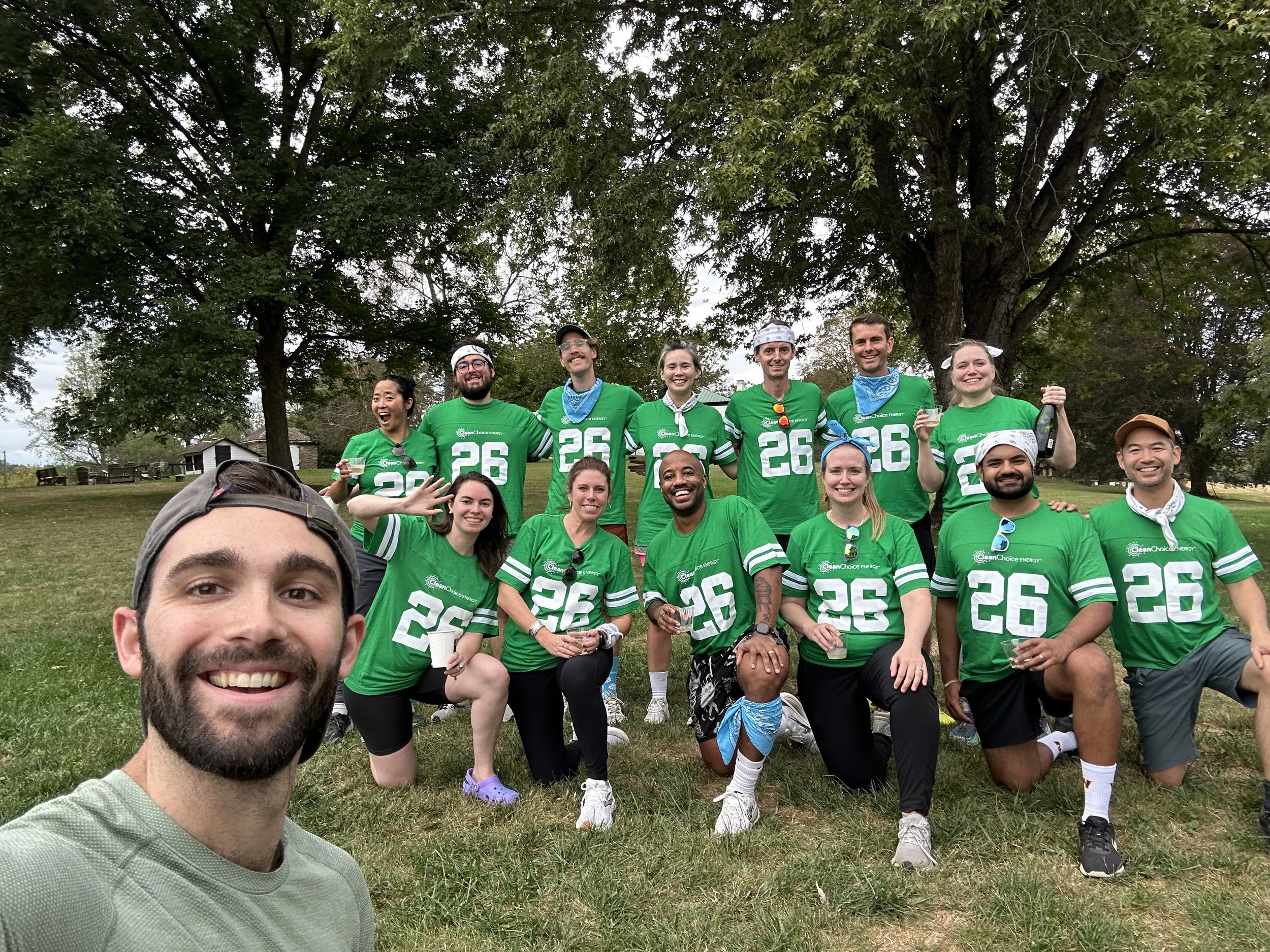 Corporate team wearing matching custom jerseys at a Throwback field day team building event