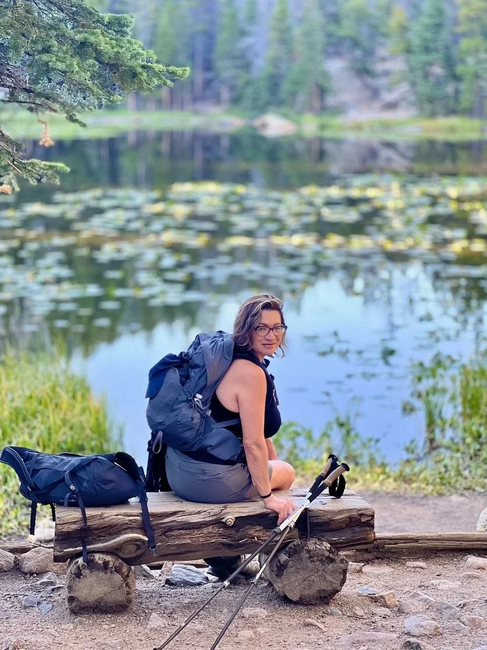Esbenia Overbeck, your life and adventure travel coach, helping women 40+ build confidence through coaching, solo travel, hiking, and group trips