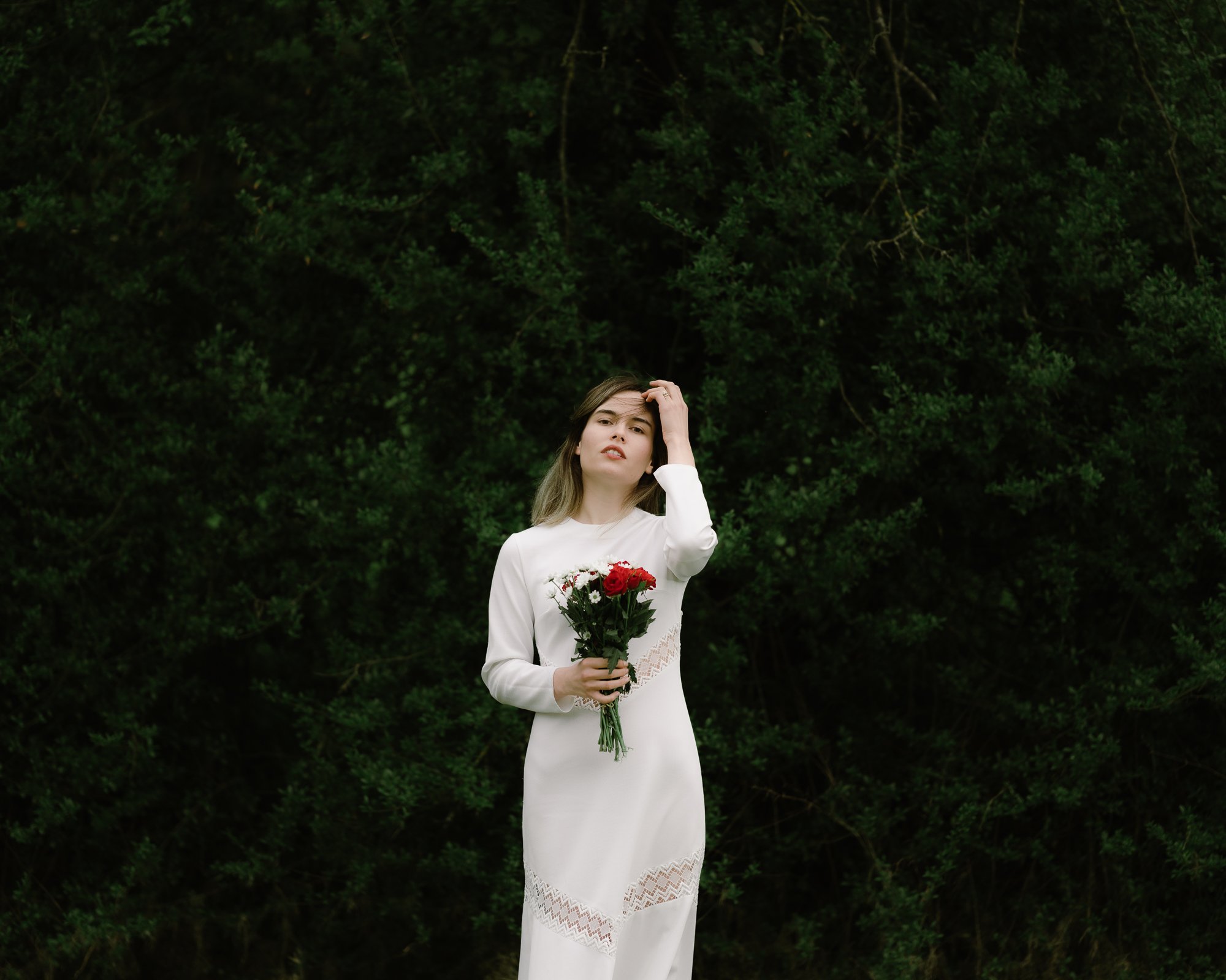 Braut mit Brautkleid Blumenstrauss Bouquet