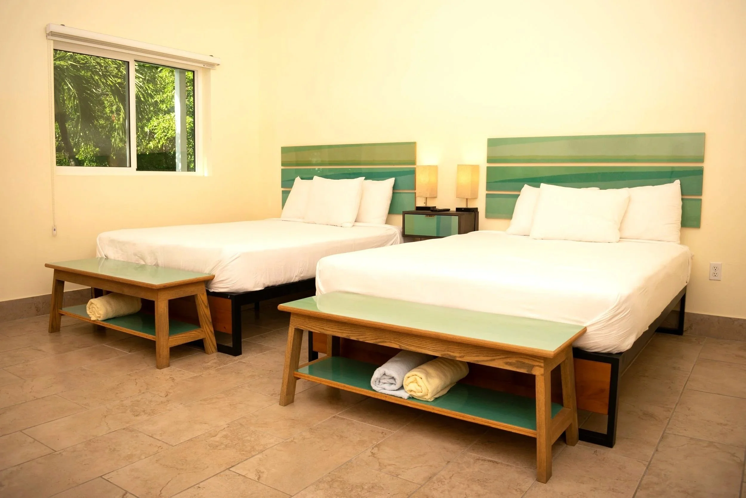 The double queen room at the Inn at Tamarind Court, our most sought-after room.