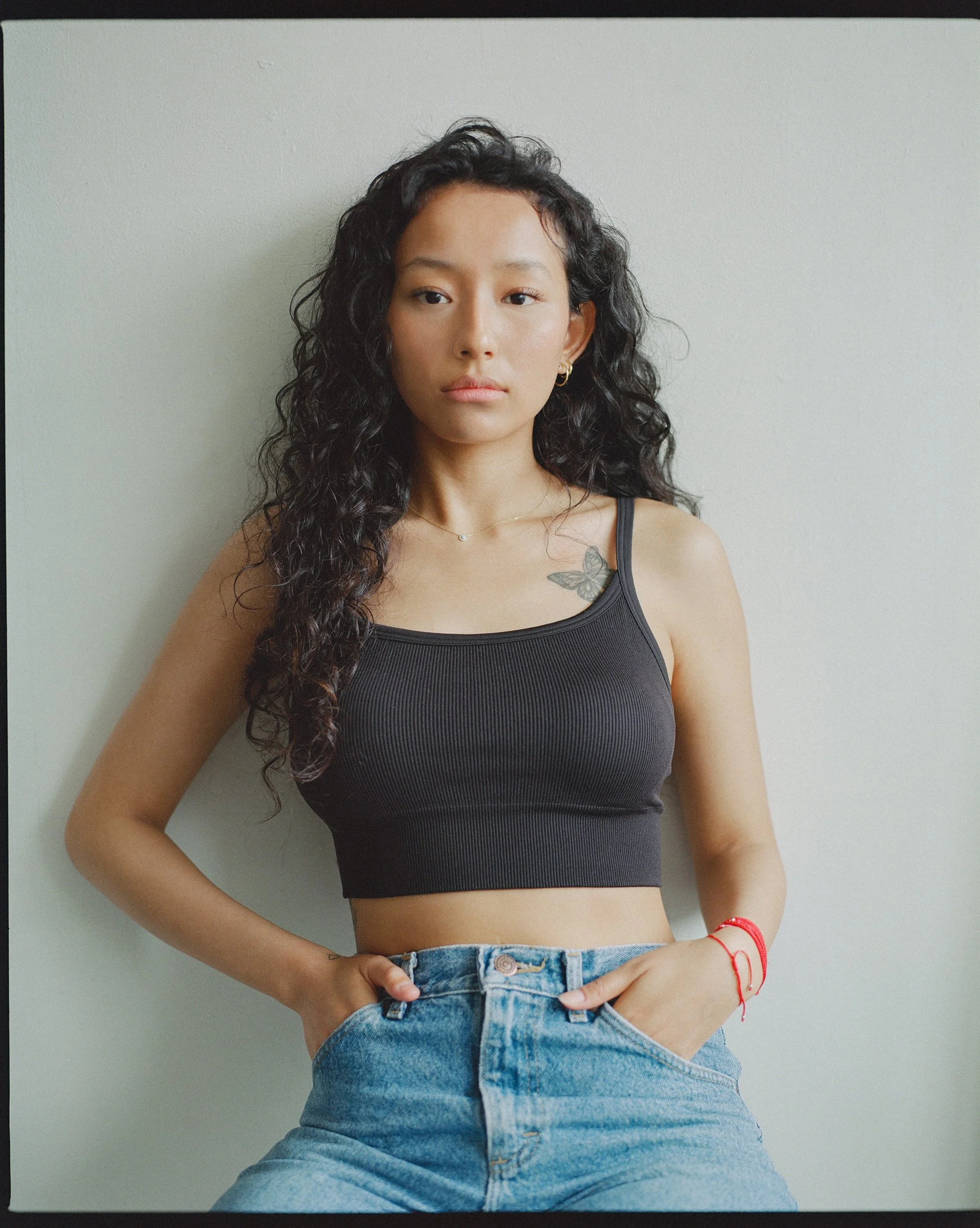 Portrait of a young girl with a butterfly tattoo, shot on Mamiya RZ 67 Pro 2, ny portrait photographer