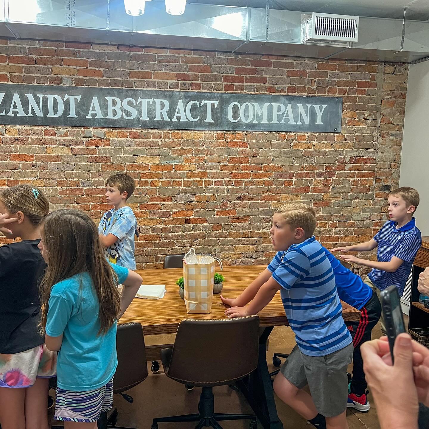 Van Zandt Abstract had some very important guests this morning!!! Debby led 12 gifted and talented students from @cantonelementary around the office, explaining what we do here and gave each one an official notepad and pen needed to take care of busi