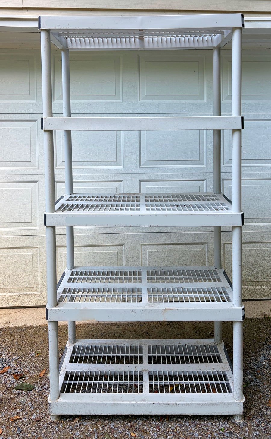 Rugged plastic shelving, perfect to store your stuff in garage or shed