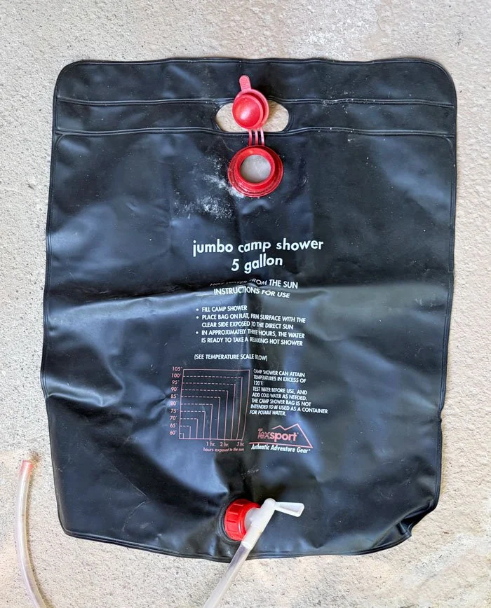 10-gallon camping shower. Warm up water in the sun and enjoy 