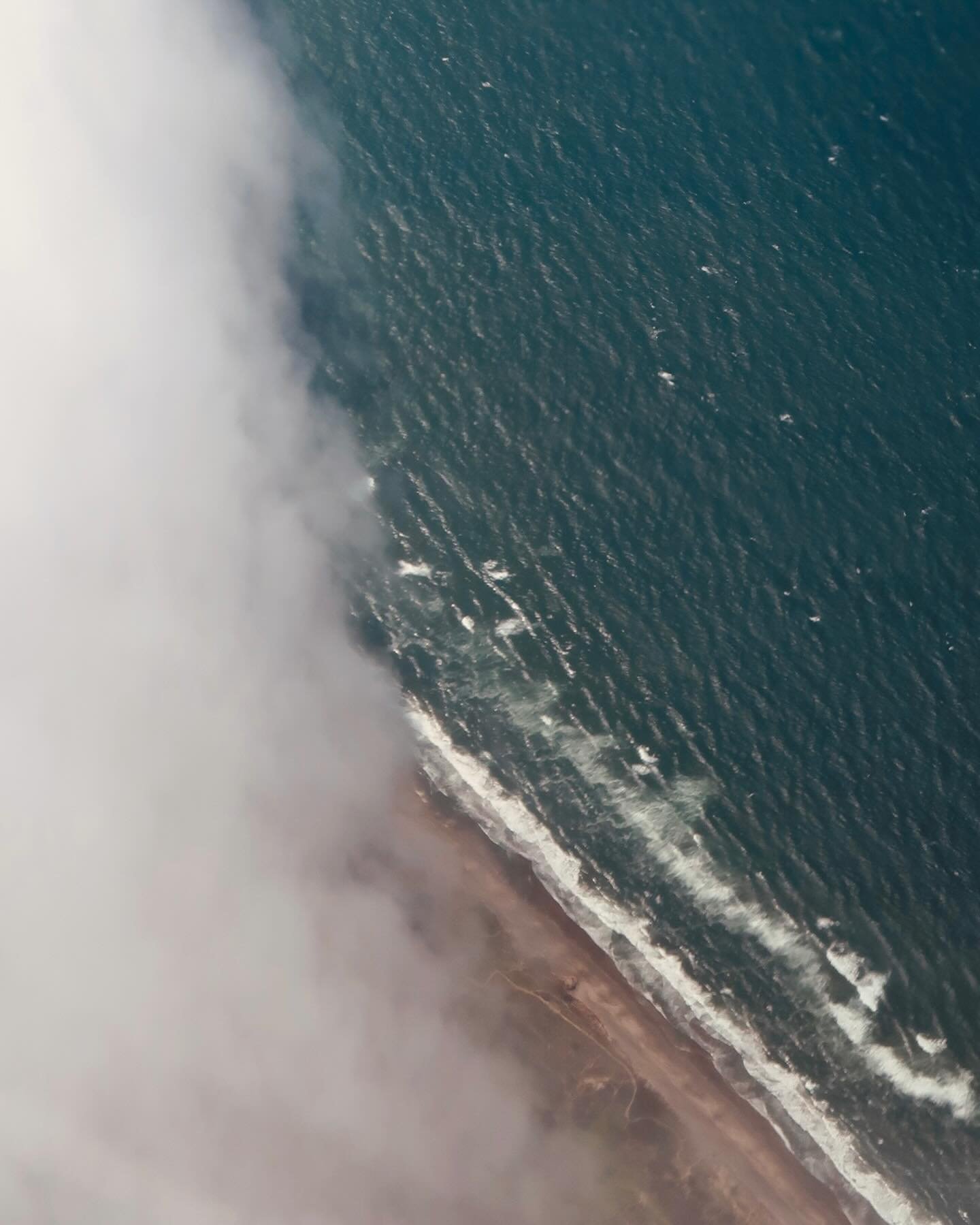 Marine Layer from above. I am used to seeing the marine layer creep in under the bridge and envelop us but sometimes when you fly into San Francisco, you&rsquo;re lucky enough to catch it crawling in from above. The last two times I&rsquo;ve flown in