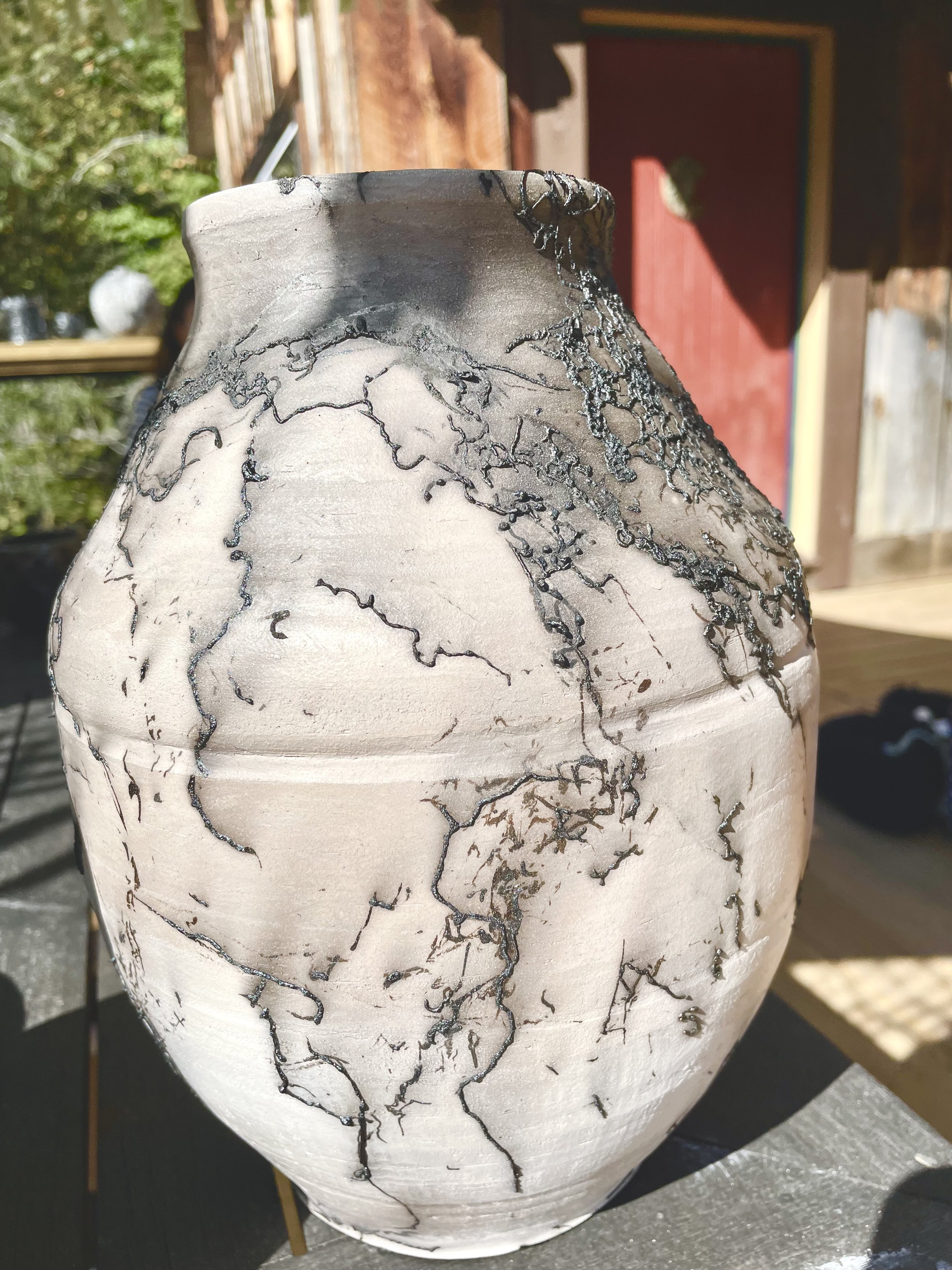 Susan Siegel, raku moon jar embedded with horse hairs from her brother's farm.
