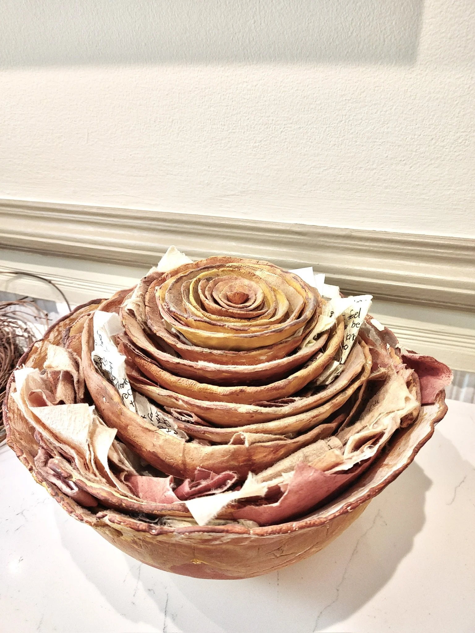 When a dear friend and Brooklyn village elder Sylvia Harris passed, Susan created a nesting bowl for her husband Gary Singer. During the memorial, mourners wrote notes and placed them in the crevices between the layers of the nested bowls.  This expe