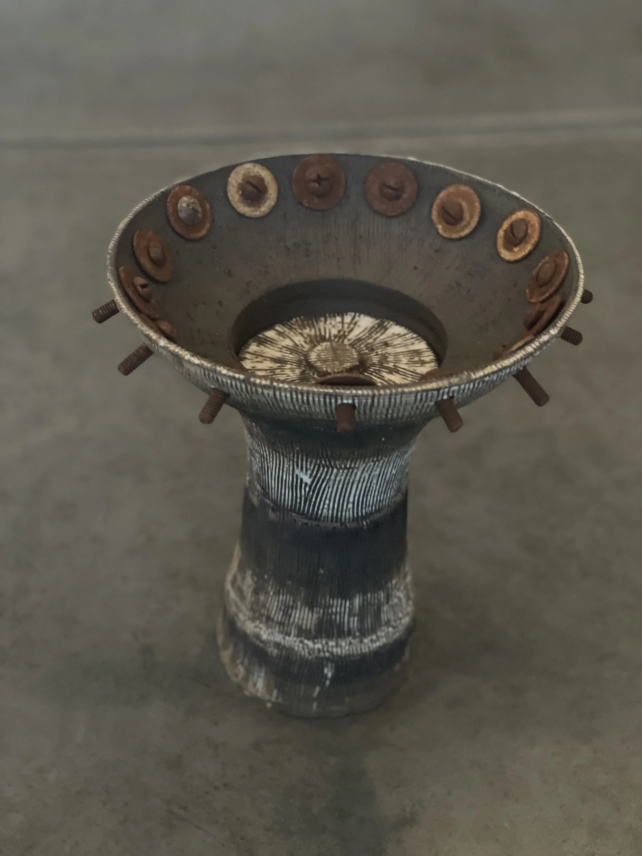 Susan Siegel, father's memorial pot containing a top that is lifted to access letters from her father.  Every year she lights a yahrzeit candle and reads the letters. 