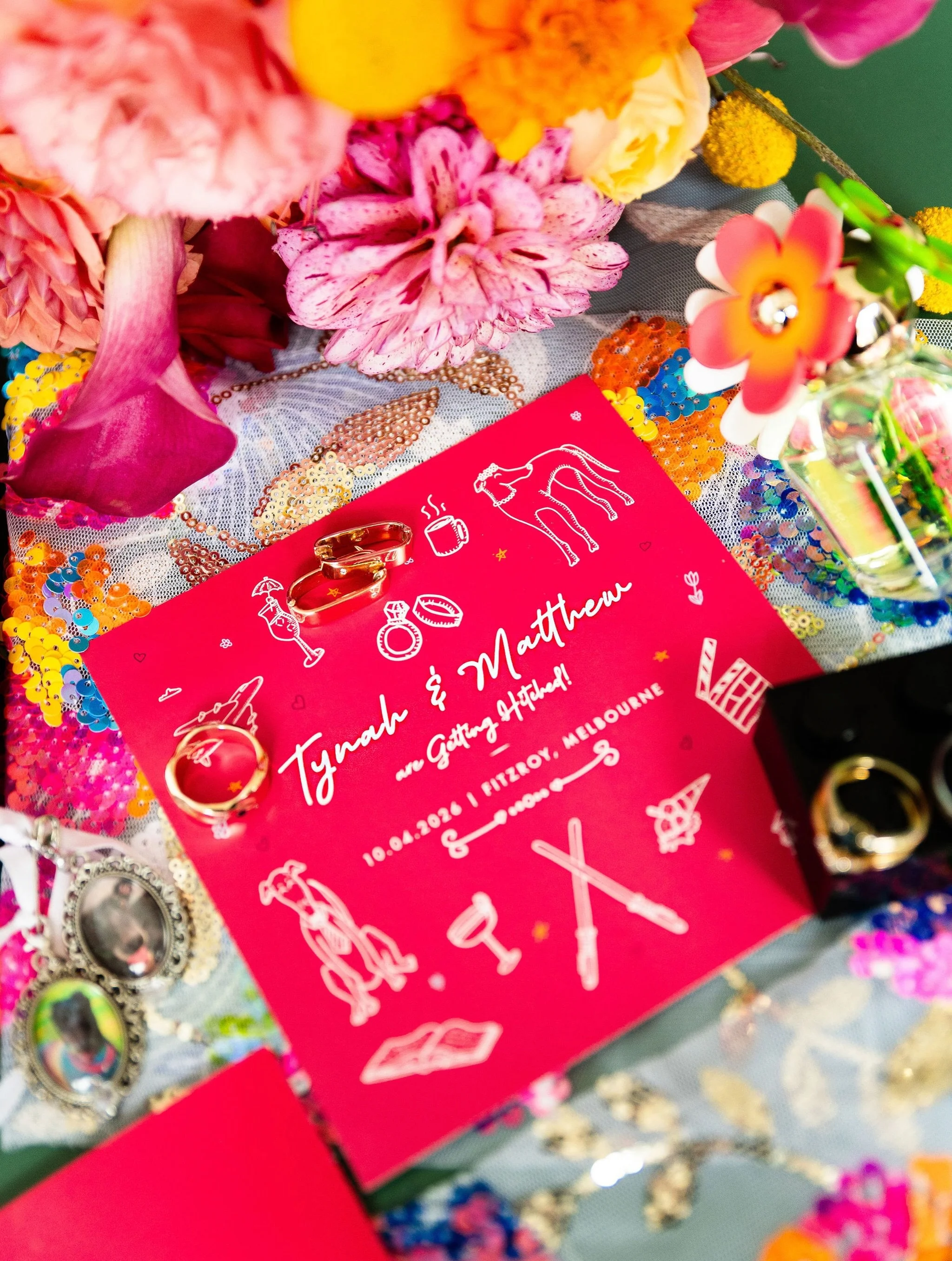 A Lego ring box, sequined veil, invites with motifs of their favourite things, and bold colour for Ty &amp; Matt&rsquo;s details 😘👌

 (a little &lsquo;self-portrait&rsquo; in the last pic 🤭🪞🌼)

Flowers by @foxy_evergreen and veil (left over fabr