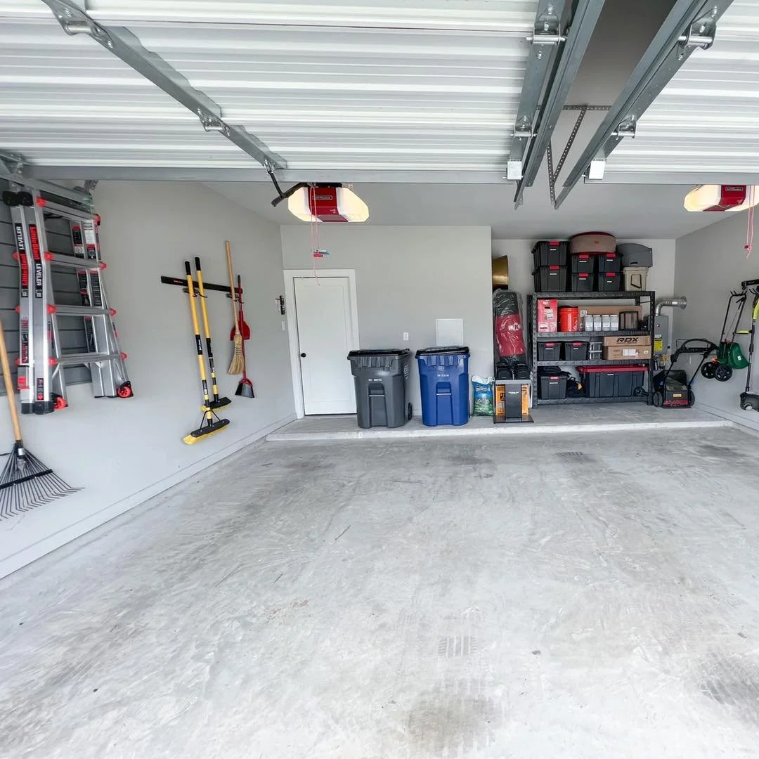 Clean garage with tools and storage shelves