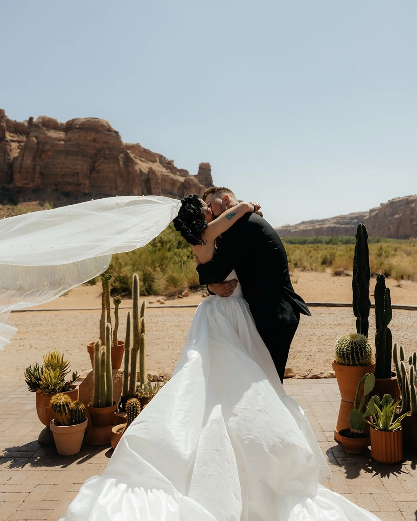 We leaned heavily into desert vibes for this S and Z. They wanted all the ingredients for their decor to be sustainable, so we selected succulents and cacti for ceremony and reception, and we added air plants to the personals. 

This setup consisted 
