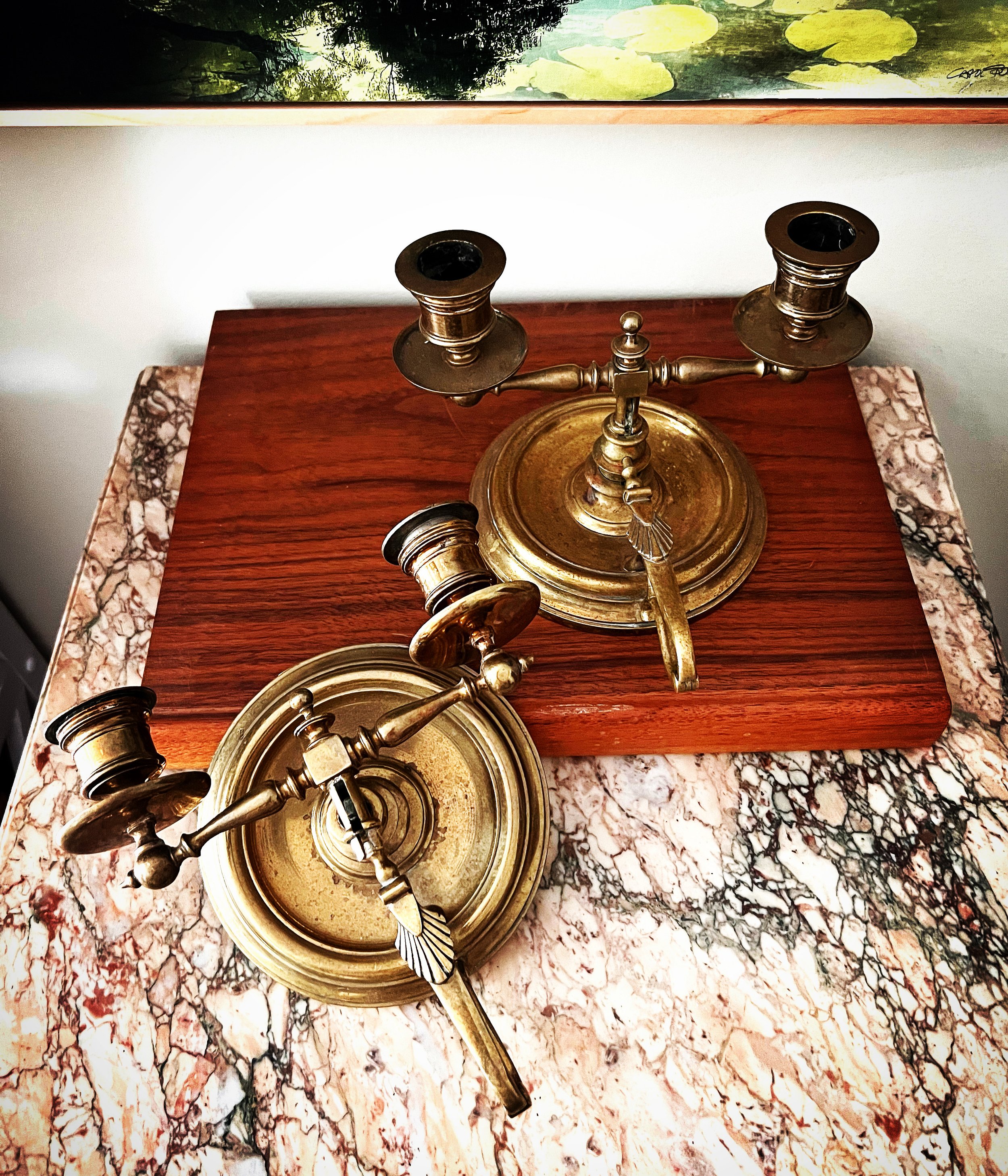 A Pair of Antique Brass Candlestick Holders