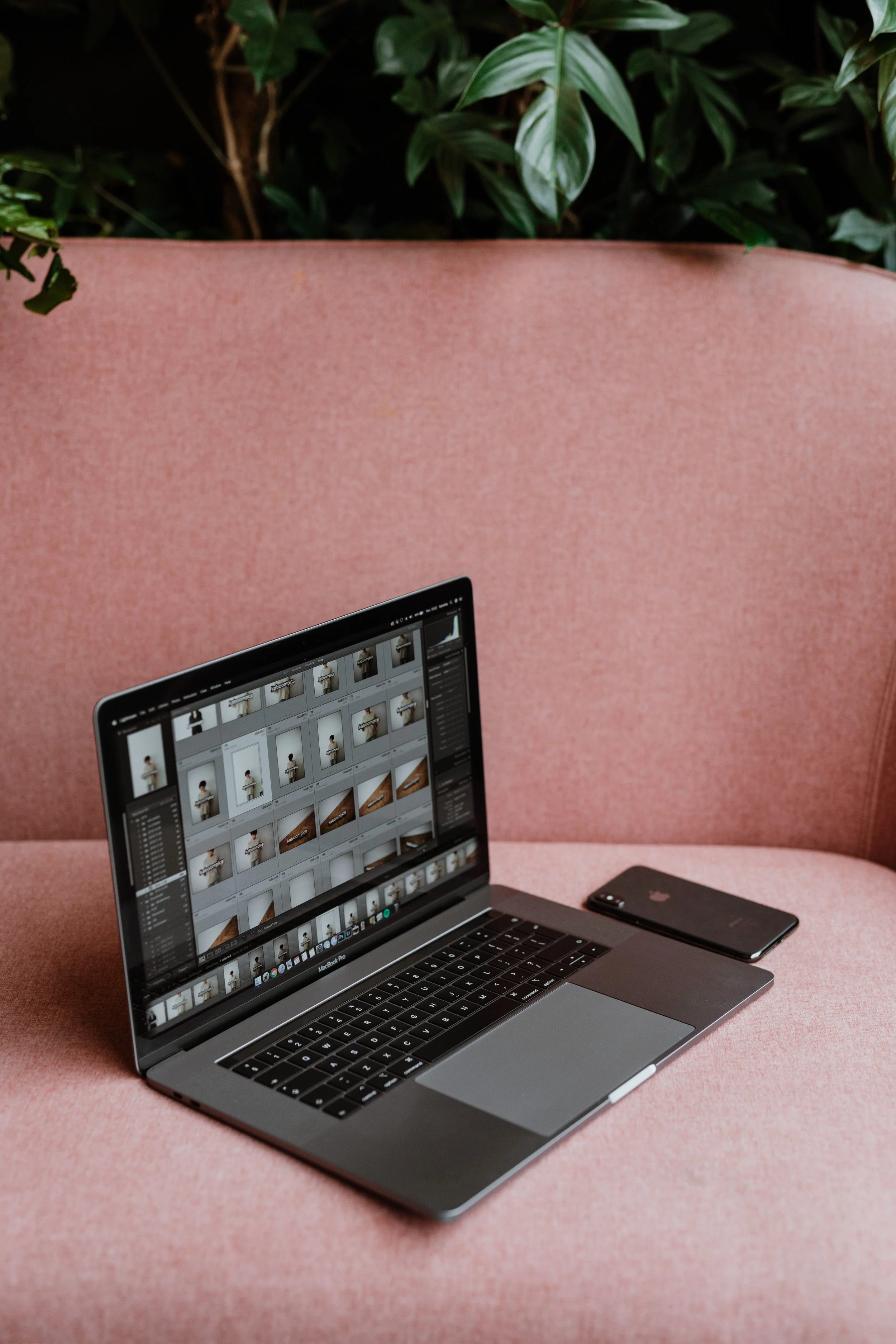 macbook-pro-laptop-iphone-x-mobile-on-a-pink-sofa