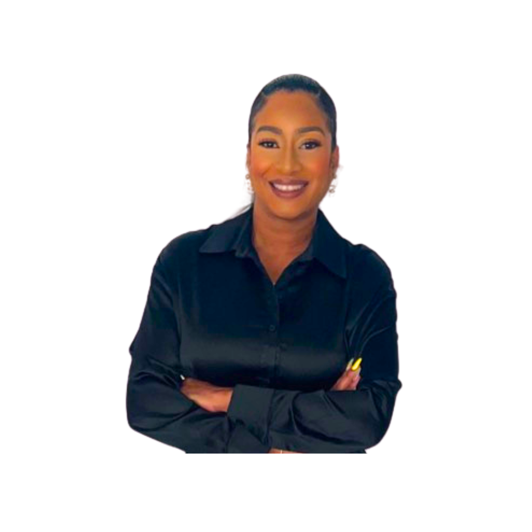 A woman with dark hair pulled back, wearing a black blouse, smiling with arms crossed against a plain white background.
