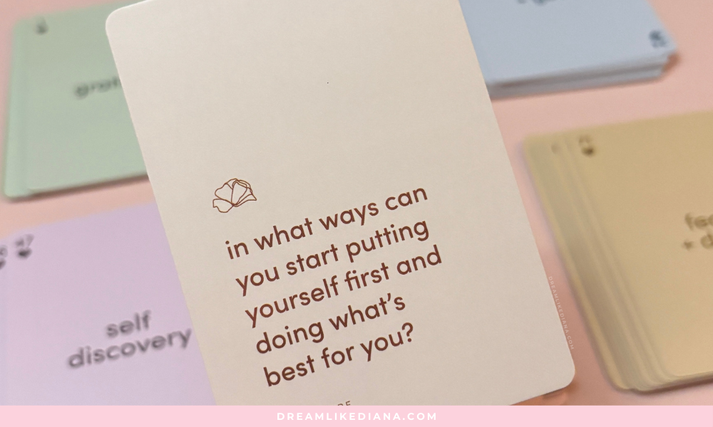 A card with the message, "In what ways can you start putting yourself first and doing what's best for you?" surrounded by pastel-colored cards.