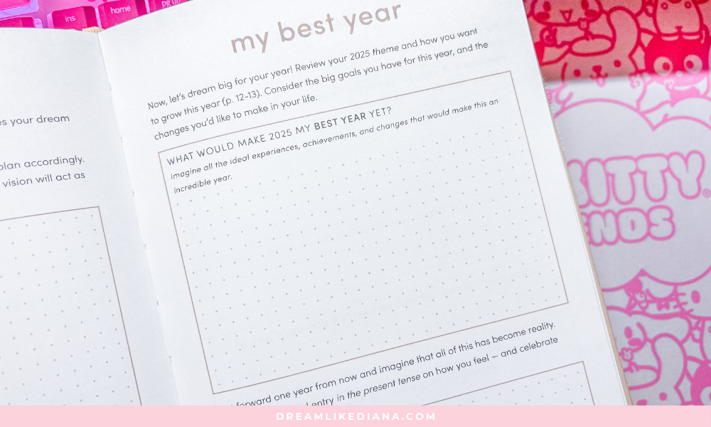 Open journal page titled "my best year," with a section prompting readers to imagine their ideal experiences for 2025. Background features a pink, cartoon-themed design, conveying a playful, optimistic tone.